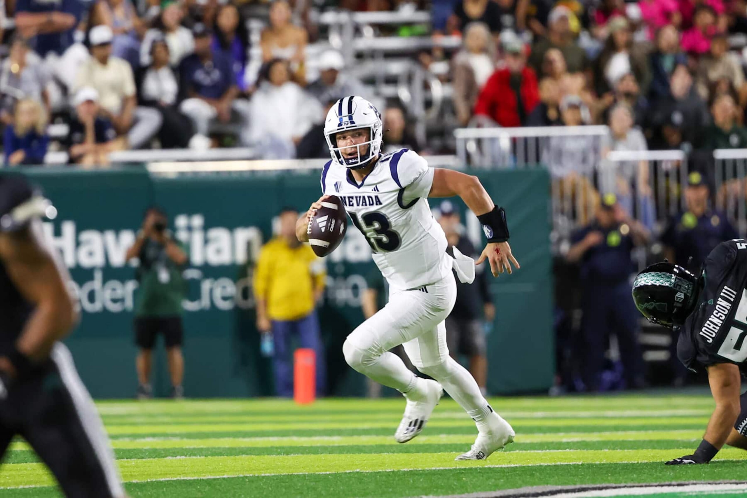 HONOLULU, HAWAII - OCTOBER 26: Chubba Purdy #13 of the Nevada Wolfpack runs the ball as he is flushed from the pocket during the first half of the game against the Hawaii Rainbow Warriors at the Clarence T.C. Ching Athletics Complex on October 26, 2024 in Honolulu, Hawaii. (Photo by Darryl Oumi/Getty Images) HONOLULU, HAWAII - OCTOBER 26: Chubba Purdy #13 of the Nevada Wolfpack runs the ball as he is flushed from the pocket during the first half of the game against the Hawaii Rainbow Warriors at the Clarence T.C. Ching Athletics Complex on October 26, 2024 in Honolulu, Hawaii. (Photo by Darryl Oumi/Getty Images)
