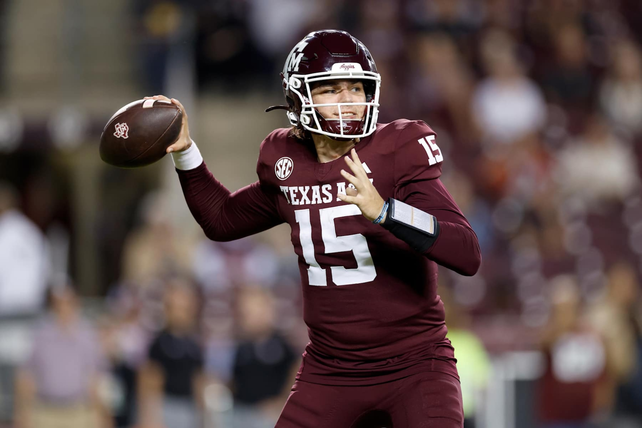COLLEGE STATION, TEXAS - NOVEMBER 16: Conner Weigman #15 of the Texas A&M Aggies looks to pass in the second half \an at Kyle Field on November 16, 2024 in College Station, Texas. (Photo by Tim Warner/Getty Images)