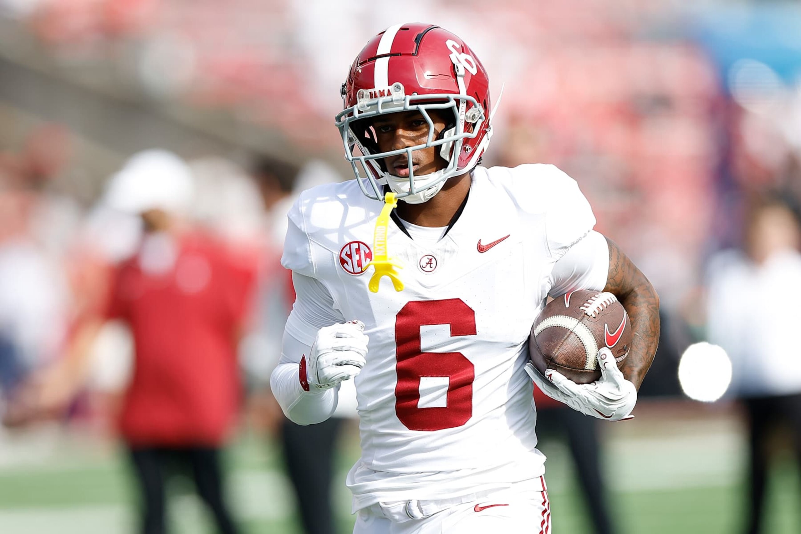MADISON, WISCONSIN - SEPTEMBER 14: Kobe Prentice #6 of the Alabama Crimson Tide warms up before game against Wisconsin Badgers at Camp Randall Stadium on September 14, 2024 in Madison, Wisconsin. (Photo by John Fisher/Getty Images)
