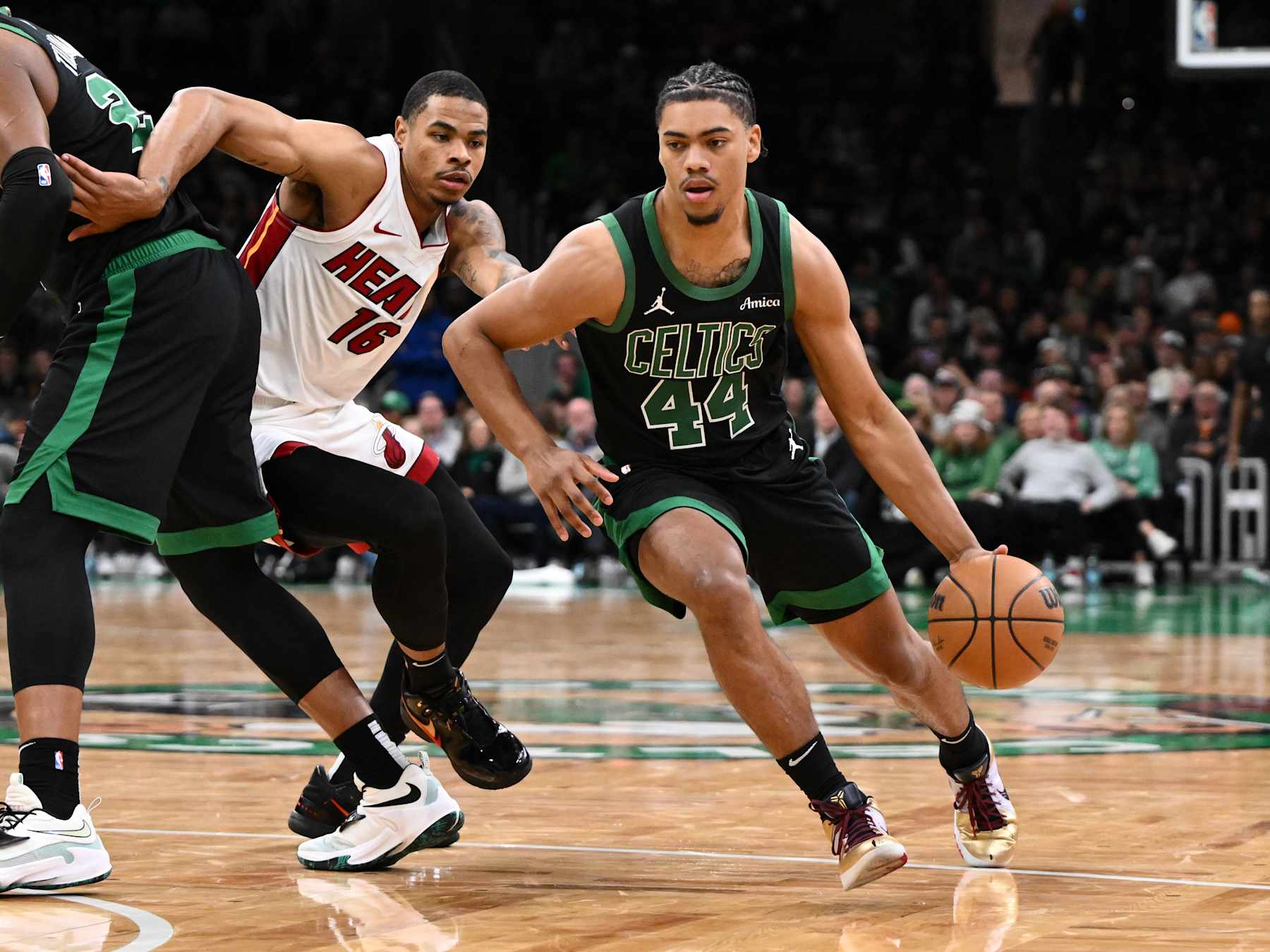 BOSTON, MASSACHUSETTS - DECEMBER 02: Jaden Springer #44 of the Boston Celtics goes to the basket against the Miami Heat during the fourth quarter at the TD Garden on December 02, 2024 in Boston, Massachusetts. NOTE TO USER: User expressly acknowledges and agrees that, by downloading and or using this photograph, User is consenting to the terms and conditions of the Getty Images License Agreement. (Photo by Brian Fluharty/Getty Images)