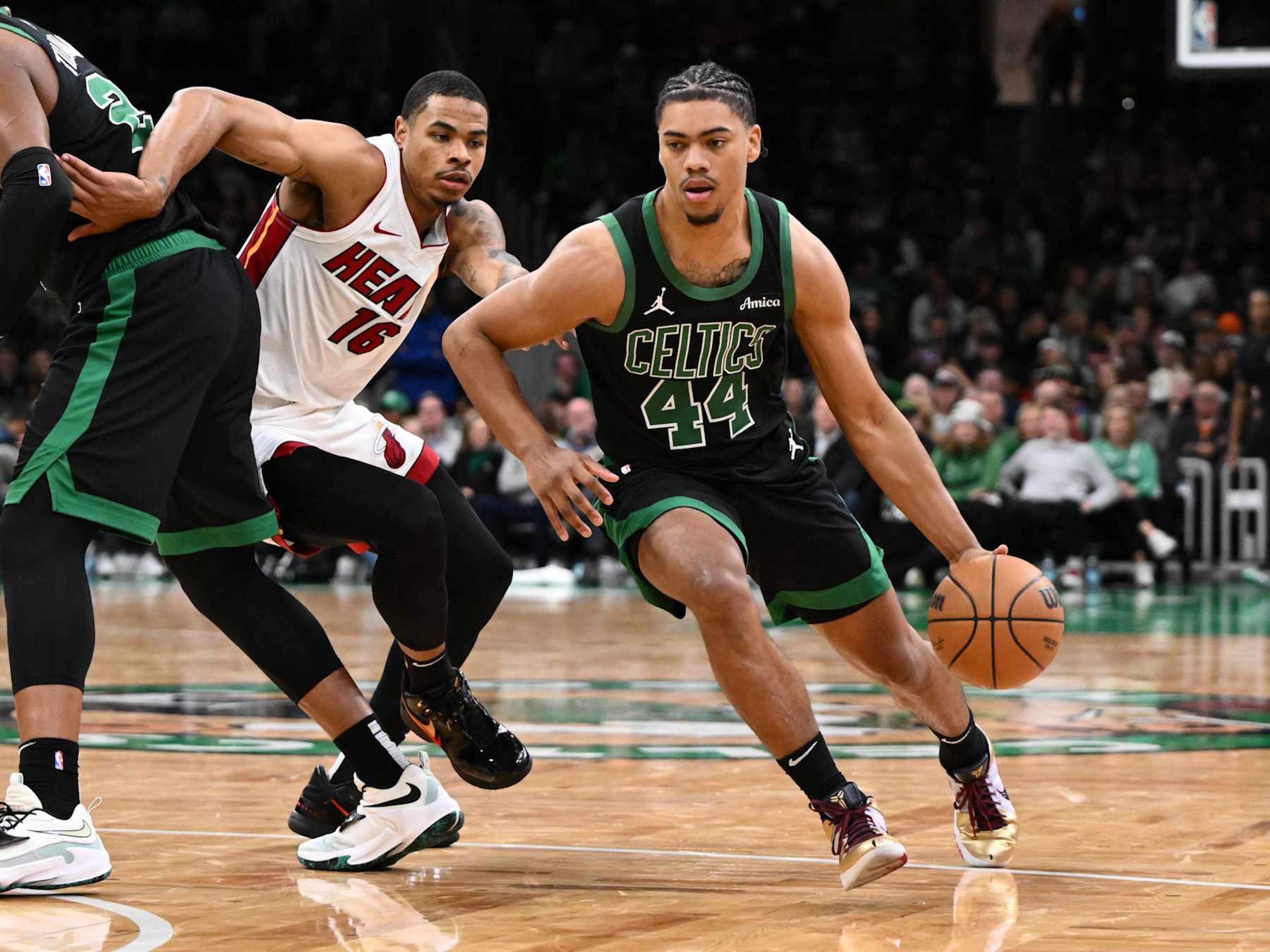 BOSTON, MASSACHUSETTS - DECEMBER 02: Jaden Springer #44 of the Boston Celtics goes to the basket against the Miami Heat during the fourth quarter at the TD Garden on December 02, 2024 in Boston, Massachusetts. NOTE TO USER: User expressly acknowledges and agrees that, by downloading and or using this photograph, User is consenting to the terms and conditions of the Getty Images License Agreement. (Photo by Brian Fluharty/Getty Images)