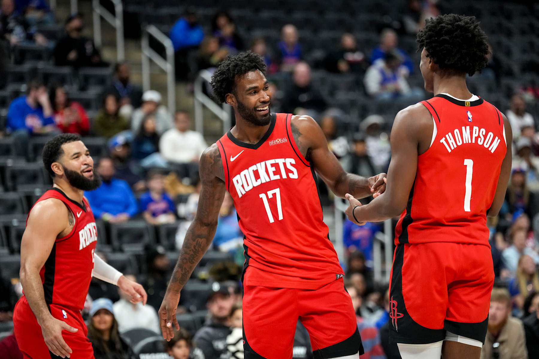 DETROIT, MICHIGAN - NOVEMBER 10: Fred VanVleet #5, Tari Eason #17 and Amen Thompson #1 of the Houston Rockets celebrate against the Detroit Pistons during the third quarter at Little Caesars Arena on November 10, 2024 in Detroit, Michigan. NOTE TO USER: User expressly acknowledges and agrees that, by downloading and or using this photograph, User is consenting to the terms and conditions of the Getty Images License Agreement. (Photo by Nic Antaya/Getty Images)