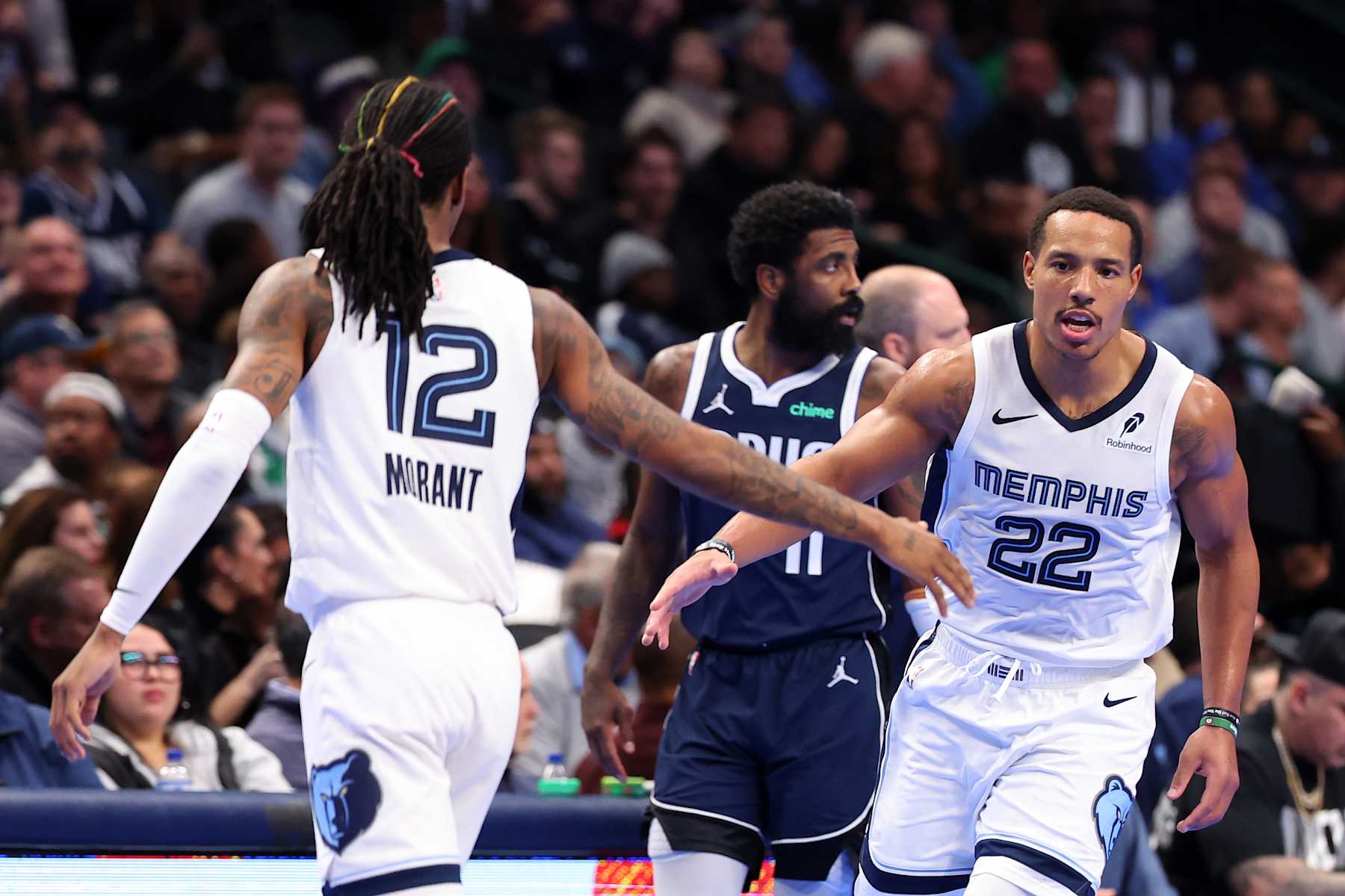 DALLAS, TEXAS - DECEMBER 03: Desmond Bane #22 and Ja Morant #12 of the Memphis Grizzlies celebrate after scoring during the second half of an Emirates NBA Cup game against the Dallas Mavericks at American Airlines Center on December 03, 2024 in Dallas, Texas. NOTE TO USER: User expressly acknowledges and agrees that, by downloading and/or using this photograph, user is consenting to the terms and conditions of the Getty Images License Agreement. (Photo by Sam Hodde/Getty Images)