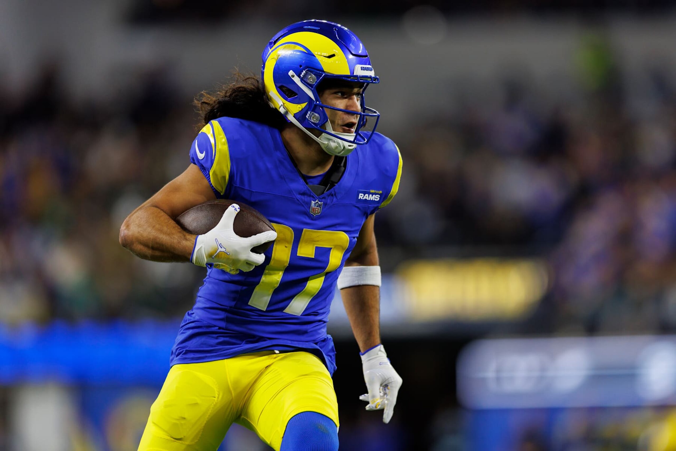INGLEWOOD, CALIFORNIA - NOVEMBER 24: Wide receiver Puka Nacua #17 of the Los Angeles Rams carries the ball during an NFL football game against the Philadelphia Eagles, at SoFi Stadium on November 24, 2024 in Inglewood, California. (Photo by Brooke Sutton/Getty Images)