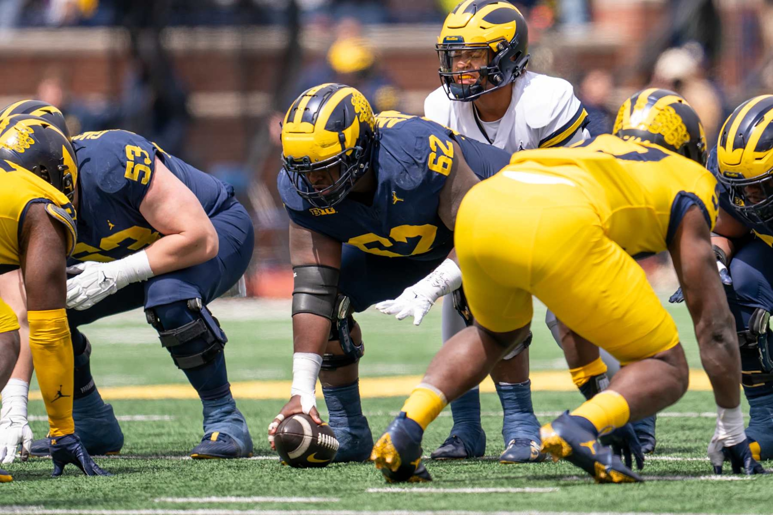 ANN ARBOR, MI - APRIL 20: Raheem Anderson #62 of the Blue Team prepares to snap the ball to Jadyn Davis #2 in the third quarter of the Michigan football spring game at Michigan Stadium on April 20, 2024 in Ann Arbor, Michigan. (Photo by Jaime Crawford/Getty Images)