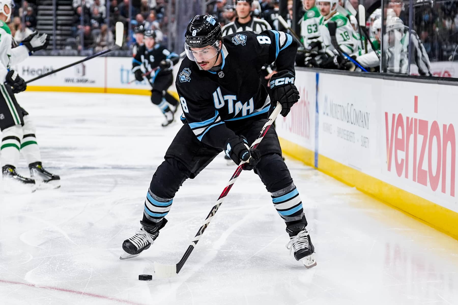SALT LAKE CITY, UTAH - DECEMBER 2: Nick Schmaltz #8 of the Utah Hockey Club skates with the puck during the first period against the Dallas Stars on December 2, 2024 at Delta Center in Salt Lake City, Utah.  (Photo by Hunter Dyke/NHLI via Getty Images)