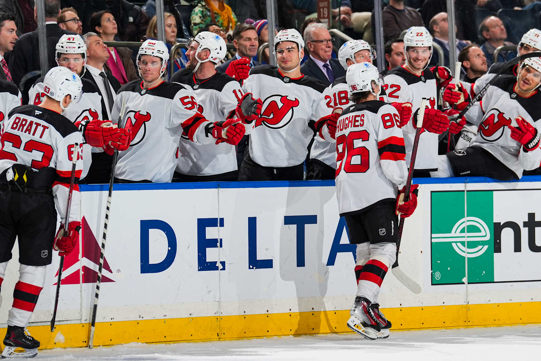 NEW YORK, NEW YORK - DECEMBER 02:  Jack Hughes #86 of the New Jersey Devils celebrates with teammates after scoring a goal in the second period against the New York Rangers at Madison Square Garden on December 2, 2024 in New York City. (Photo by Jared Silber/NHLI via Getty Images)
