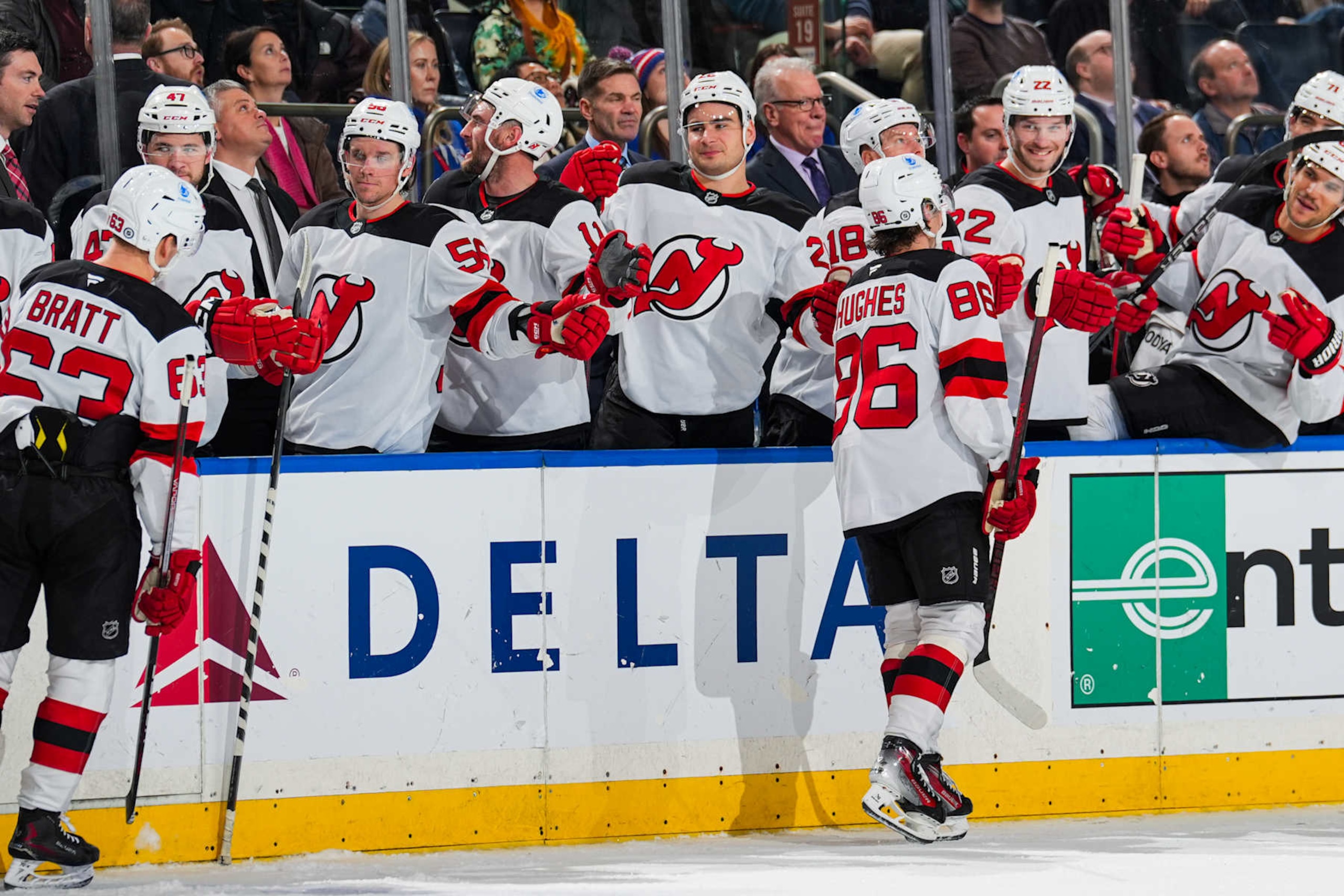 NEW YORK, NEW YORK - DECEMBER 02:  Jack Hughes #86 of the New Jersey Devils celebrates with teammates after scoring a goal in the second period against the New York Rangers at Madison Square Garden on December 2, 2024 in New York City. (Photo by Jared Silber/NHLI via Getty Images)