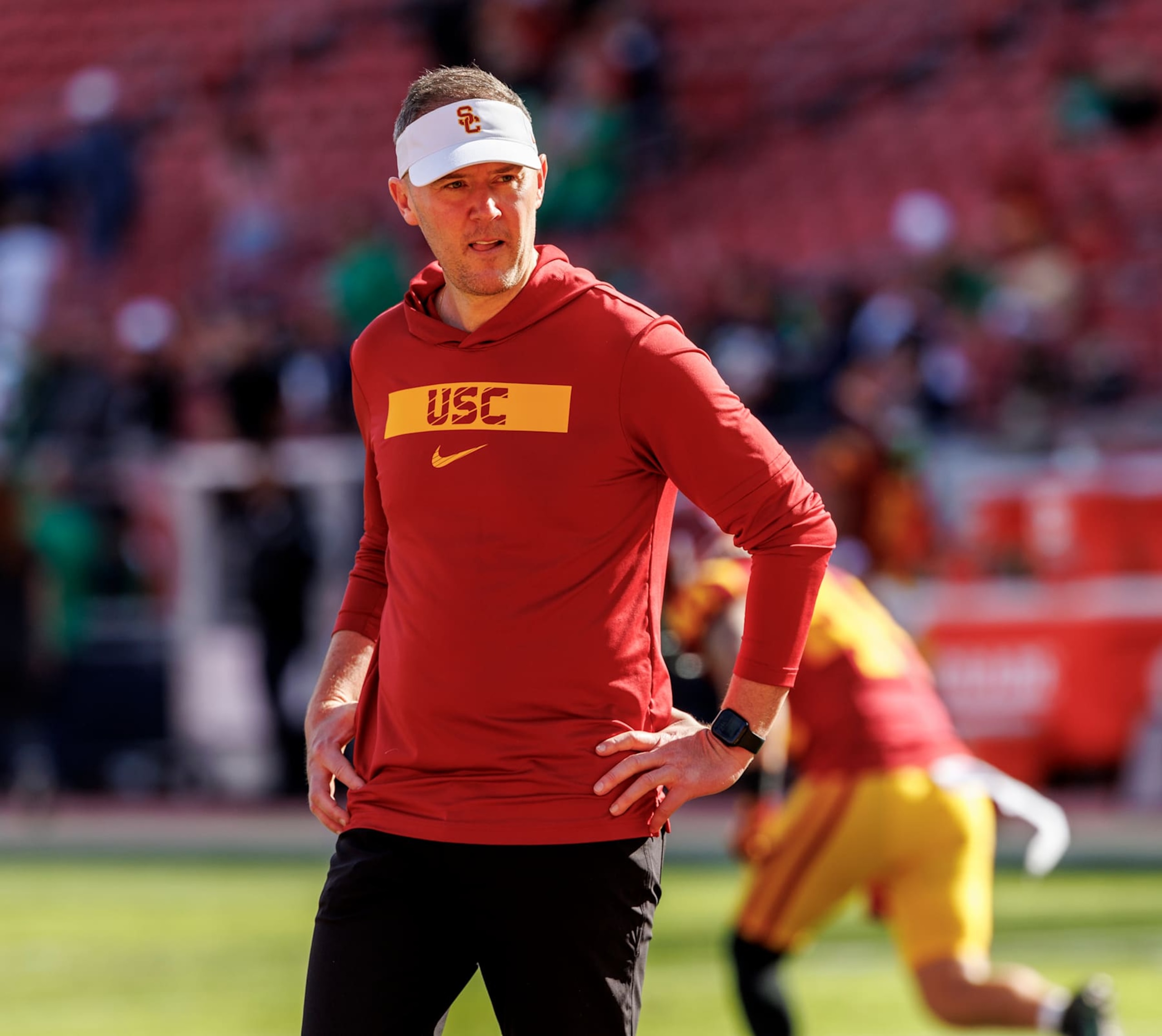 LOS ANGELES, CA - NOVEMBER 30, 2024: USC Trojans head coach Lincoln Riley watches warm ups before the game against Notre Dame  at the LA Coliseum  on November 30, 2024 in Los Angeles, California. (Gina Ferazzi / Los Angeles Times via Getty Images)