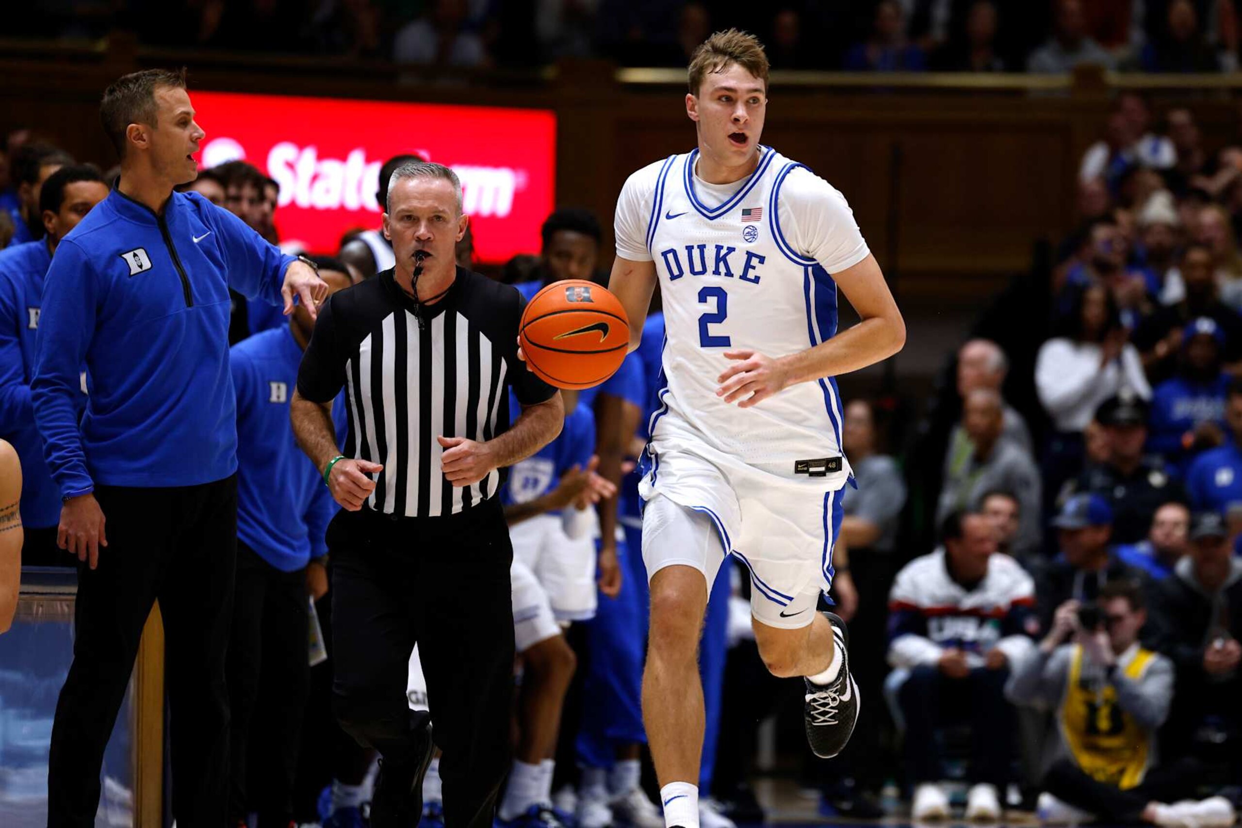 DURHAM, NORTH CAROLINA - DECEMBER 4: Cooper Flagg #2 of the Duke Blue Devils dribbles up court against the Auburn Tigers during the first half of the game at Cameron Indoor Stadium on December 4, 2024 in Durham, North Carolina. (Photo by Lance King/Getty Images) DURHAM, NORTH CAROLINA - DECEMBER 4: Cooper Flagg #2 of the Duke Blue Devils dribbles up court against the Auburn Tigers during the first half of the game at Cameron Indoor Stadium on December 4, 2024 in Durham, North Carolina. (Photo by Lance King/Getty Images)