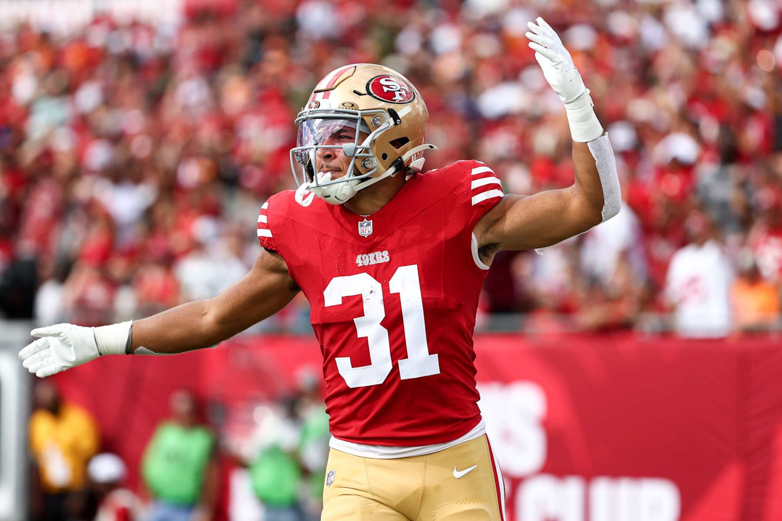 TAMPA, FLORIDA - NOVEMBER 10: Isaac Guerendo #31 of the San Francisco 49ers pumps up the crowd during an NFL football game against the Tampa Bay Buccaneers at Raymond James Stadium on November 10, 2024 in Tampa, Florida. (Photo by Kevin Sabitus/Getty Images)