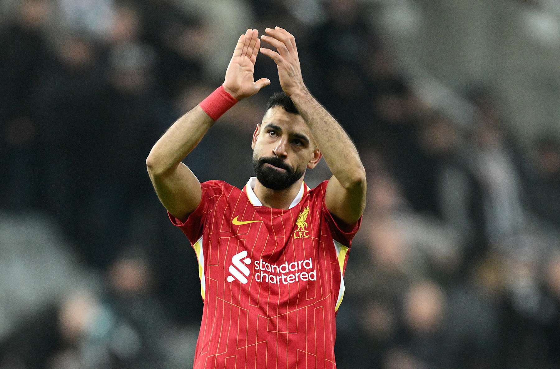 NEWCASTLE UPON TYNE, ENGLAND - DECEMBER 04: Mohamed Salah of Liverpool applauds the fans after  during the Premier League match between Newcastle United FC and Liverpool FC at St James' Park on December 04, 2024 in Newcastle upon Tyne, England. (Photo by Justin Setterfield/Getty Images)