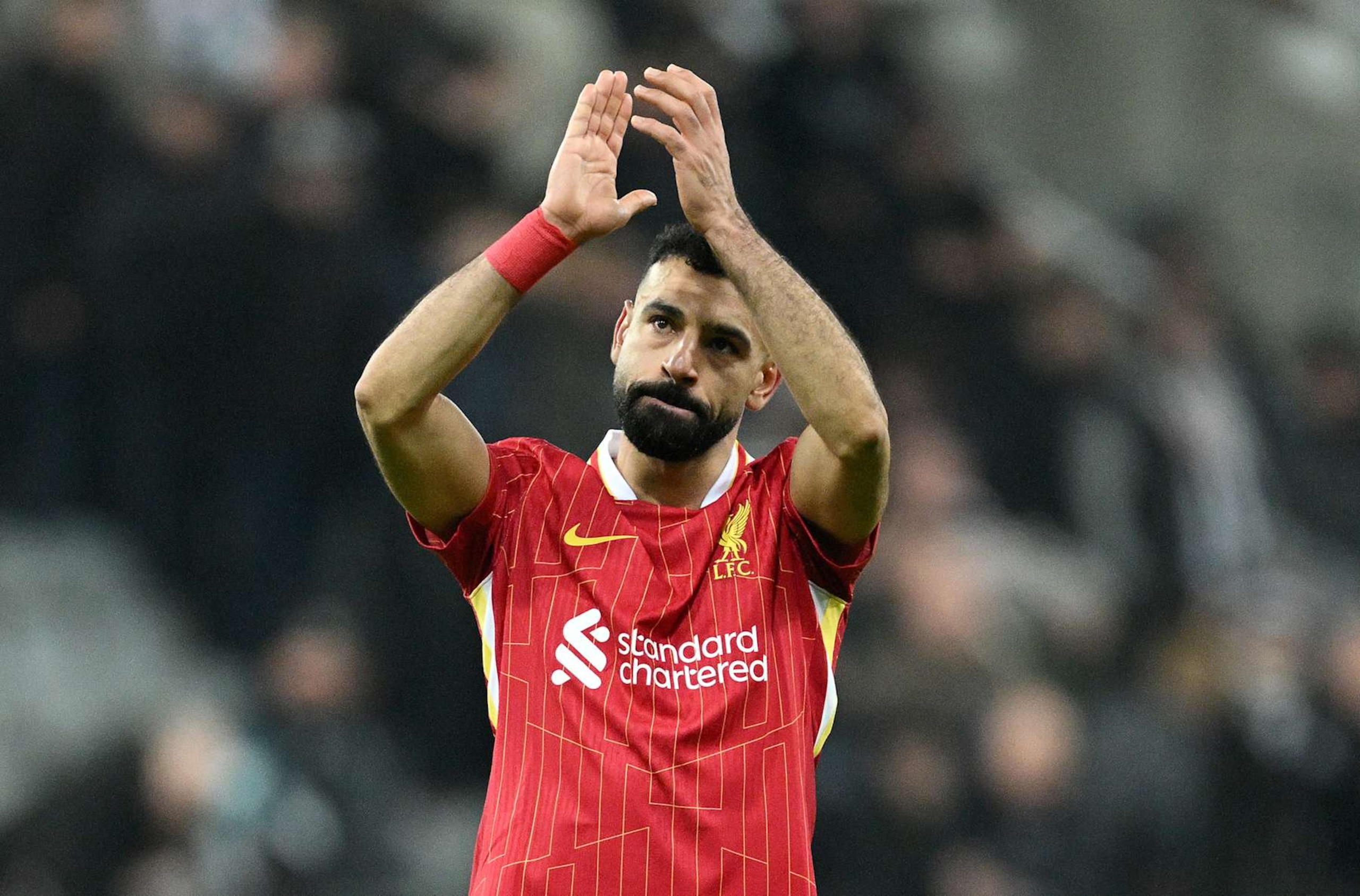 NEWCASTLE UPON TYNE, ENGLAND - DECEMBER 04: Mohamed Salah of Liverpool applauds the fans after  during the Premier League match between Newcastle United FC and Liverpool FC at St James' Park on December 04, 2024 in Newcastle upon Tyne, England. (Photo by Justin Setterfield/Getty Images)