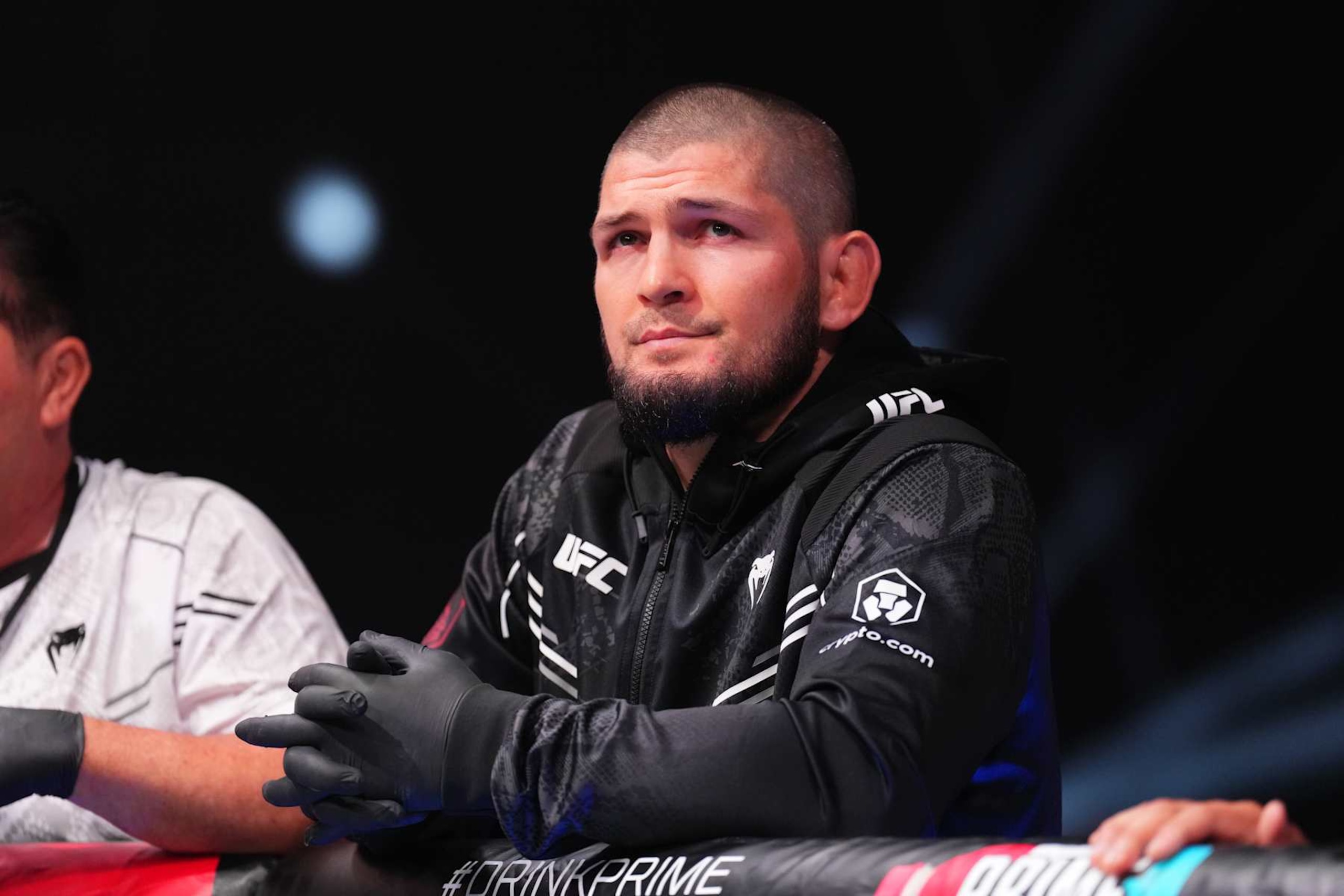 ABU DHABI, UNITED ARAB EMIRATES - AUGUST 03: Coach Khabib Nurmagomedov stands in the corner of Umar Nurmagomedov of Russia before his bantamweight fight during the UFC Fight Night event at Etihad Arena on August 03, 2024 in Abu Dhabi, United Arab Emirates. (Photo by Josh Hedges/Zuffa LLC via Getty Images)