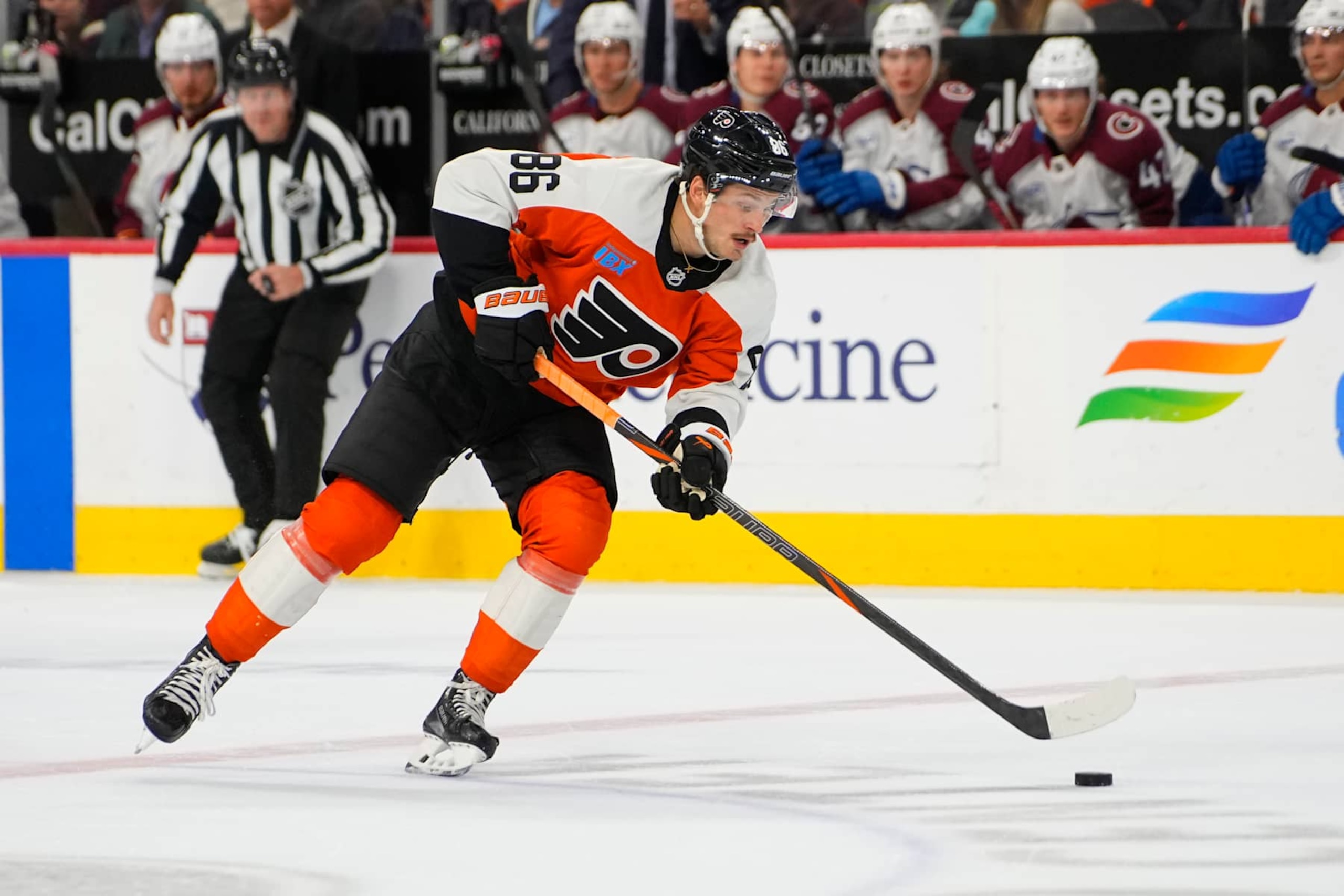 PHILADELPHIA, PA - NOVEMBER 18: Philadelphia Flyers Left Wing Joel Farabee (86) skates with the puck during the second period of the National Hockey League game between the Colorado Avalanche and the Philadelphia Flyers on November 18, 2024, at the Wells Fargo Center in Philadelphia, PA. (Photo by Gregory Fisher/Icon Sportswire via Getty Images)