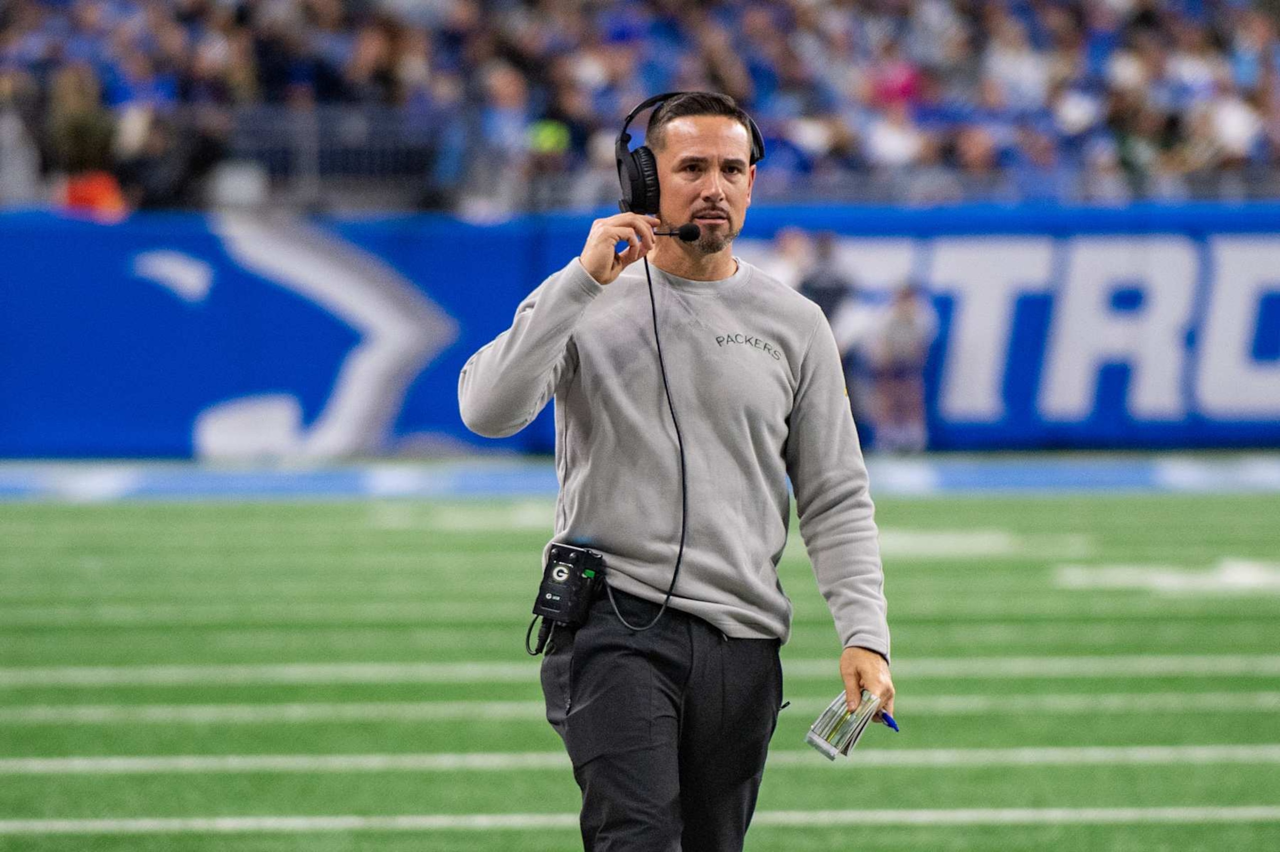 DETROIT, MICHIGAN - DECEMBER 05: Head Football Coach Matt LaFleur of the Green Bay Packers walks up field during the first half of a NFL game against the Detroit Lions at Ford Field on December 05, 2024 in Detroit, Michigan. (Photo by Aaron J. Thornton/Getty Images)