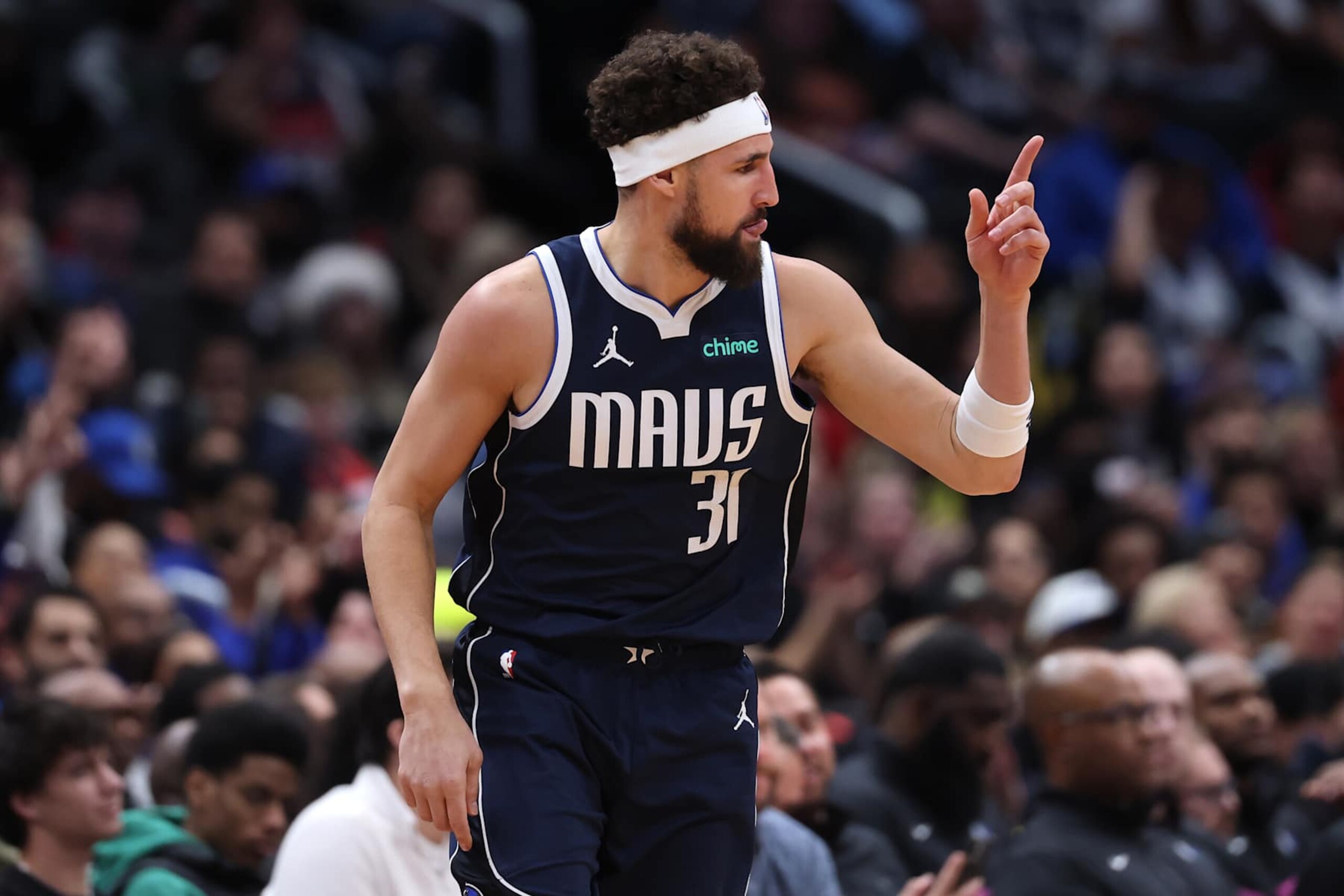 WASHINGTON, DC - DECEMBER 05: Klay Thompson #31 of the Dallas Mavericks reacts after scoring against the Washington Wizards during the first half at Capital One Arena on December 05, 2024 in Washington, DC. NOTE TO USER: User expressly acknowledges and agrees that, by downloading and or using this photograph, User is consenting to the terms and conditions of the Getty Images License Agreement. (Photo by Patrick Smith/Getty Images)