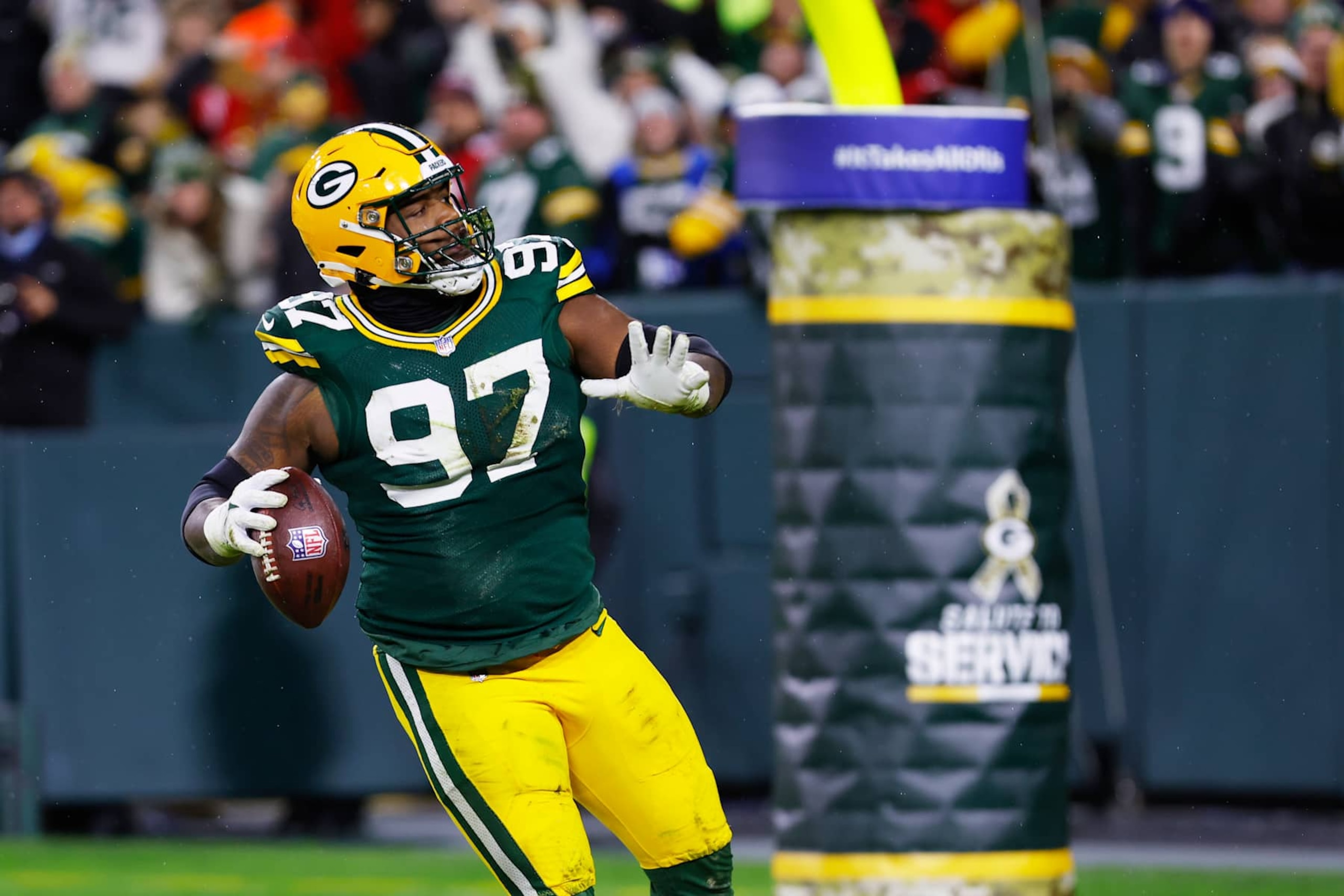 GREEN BAY, WI - NOVEMBER 24: Green Bay Packers defensive tackle Kenny Clark (97) throws his fumble recovery into the stands during a game between the Green Bay Packers and the San Francisco 49ers at Lambeau Field on November 24, 2024 in Green Bay, WI. (Photo by Larry Radloff/Icon Sportswire via Getty Images) GREEN BAY, WI - NOVEMBER 24: Green Bay Packers defensive tackle Kenny Clark (97) throws his fumble recovery into the stands during a game between the Green Bay Packers and the San Francisco 49ers at Lambeau Field on November 24, 2024 in Green Bay, WI. (Photo by Larry Radloff/Icon Sportswire via Getty Images)
