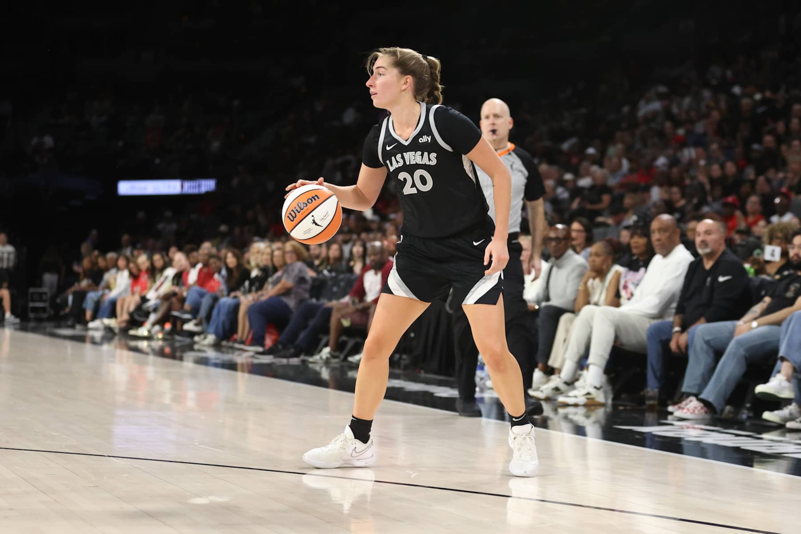 LAS VEGAS, NV - SEPTEMBER 19: Kate Martin #20 of the Las Vegas Aces dribbles the ball during the game against the Dallas Wings on September 19, 2024 at Michelob ULTRA Arena in Las Vegas, Nevada. NOTE TO USER: User expressly acknowledges and agrees that, by downloading and or using this photograph, User is consenting to the terms and conditions of the Getty Images License Agreement. Mandatory Copyright Notice: Copyright 2024 NBAE (Photo by Ian Maule/NBAE via Getty Images) LAS VEGAS, NV - SEPTEMBER 19: Kate Martin #20 of the Las Vegas Aces dribbles the ball during the game against the Dallas Wings on September 19, 2024 at Michelob ULTRA Arena in Las Vegas, Nevada. NOTE TO USER: User expressly acknowledges and agrees that, by downloading and or using this photograph, User is consenting to the terms and conditions of the Getty Images License Agreement. Mandatory Copyright Notice: Copyright 2024 NBAE (Photo by Ian Maule/NBAE via Getty Images)