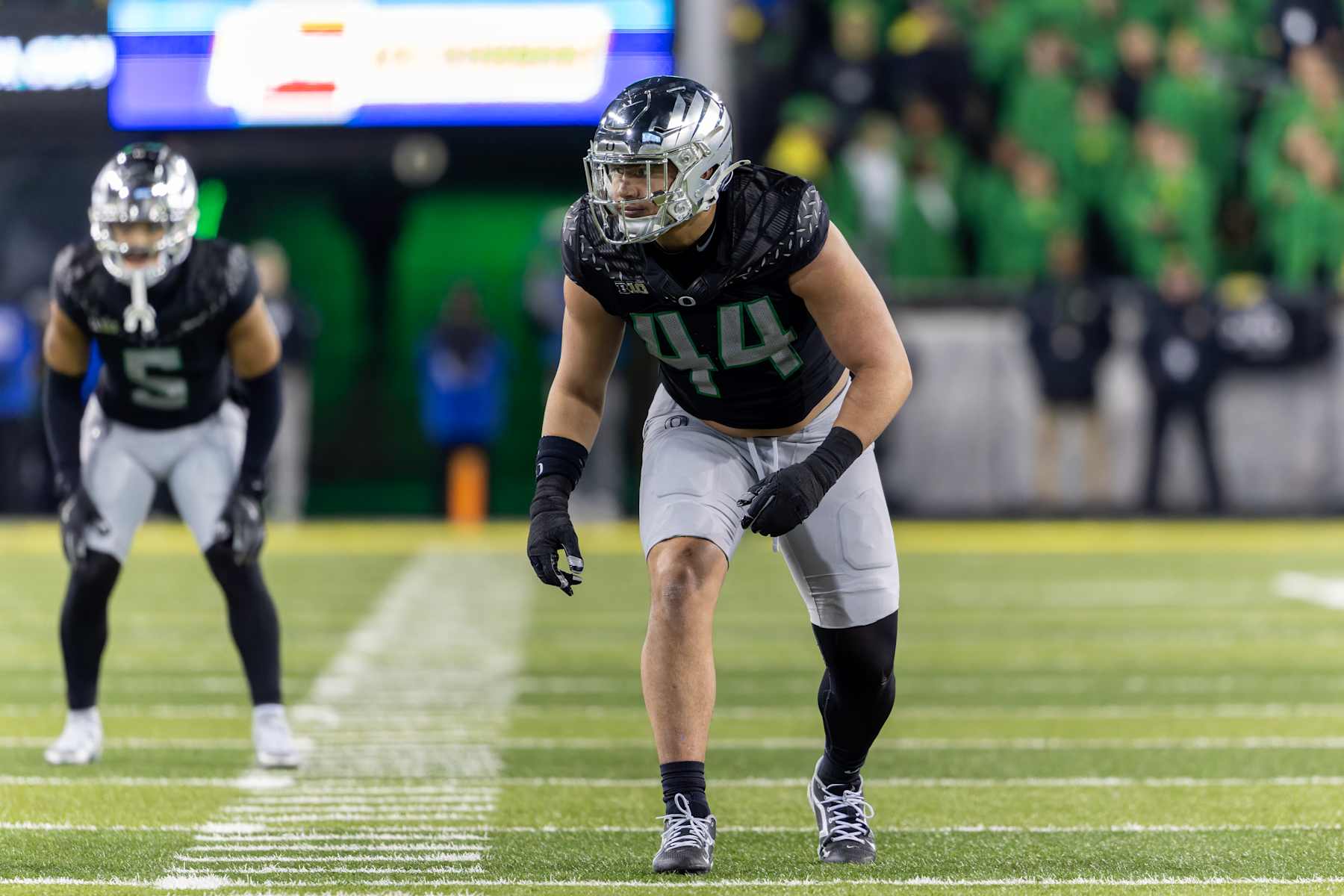 EUGENE, OREGON - NOVEMBER 30: Linebacker Teitum Tuioti #44 of the Oregon Ducks runs on the field against the Washington Huskies at Autzen Stadium on November 30, 2024 in Eugene, Oregon. (Photo by Tom Hauck/Getty Images)