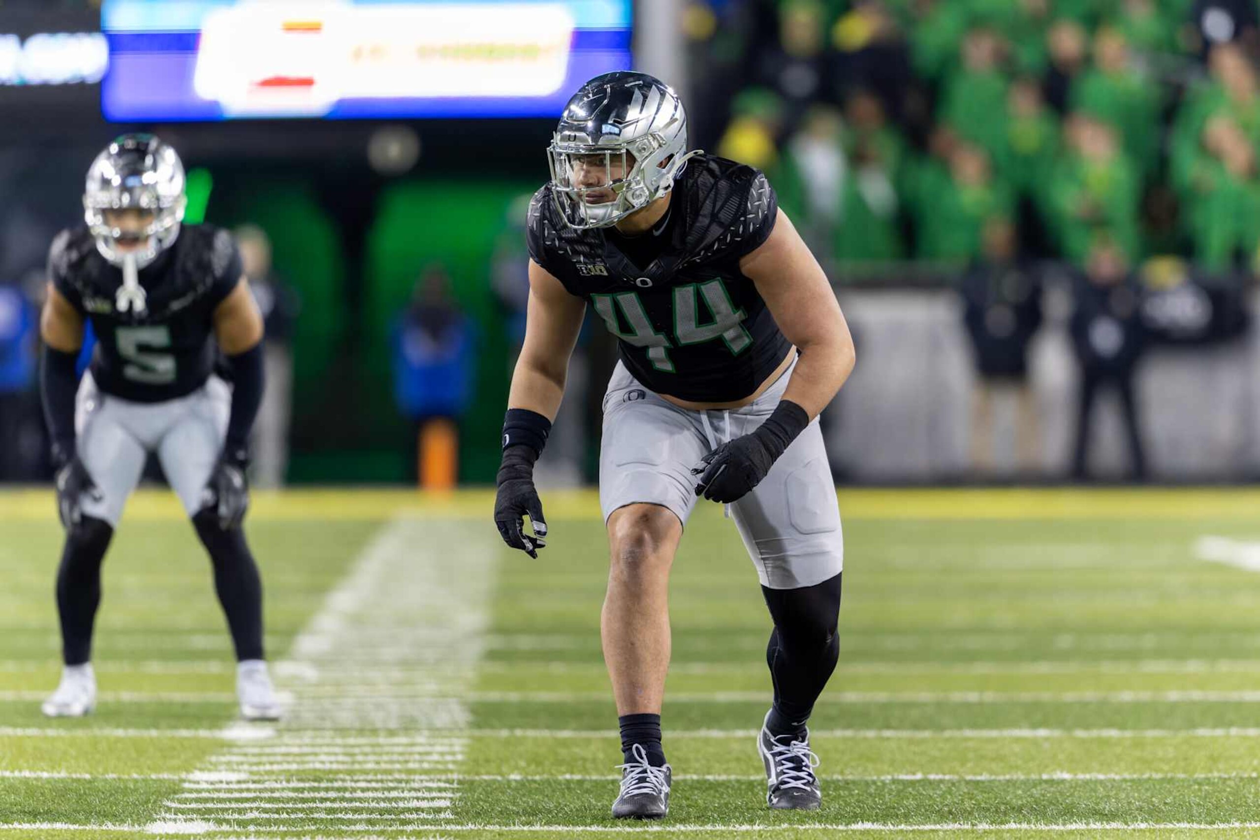 EUGENE, OREGON - NOVEMBER 30: Linebacker Teitum Tuioti #44 of the Oregon Ducks runs on the field against the Washington Huskies at Autzen Stadium on November 30, 2024 in Eugene, Oregon. (Photo by Tom Hauck/Getty Images)