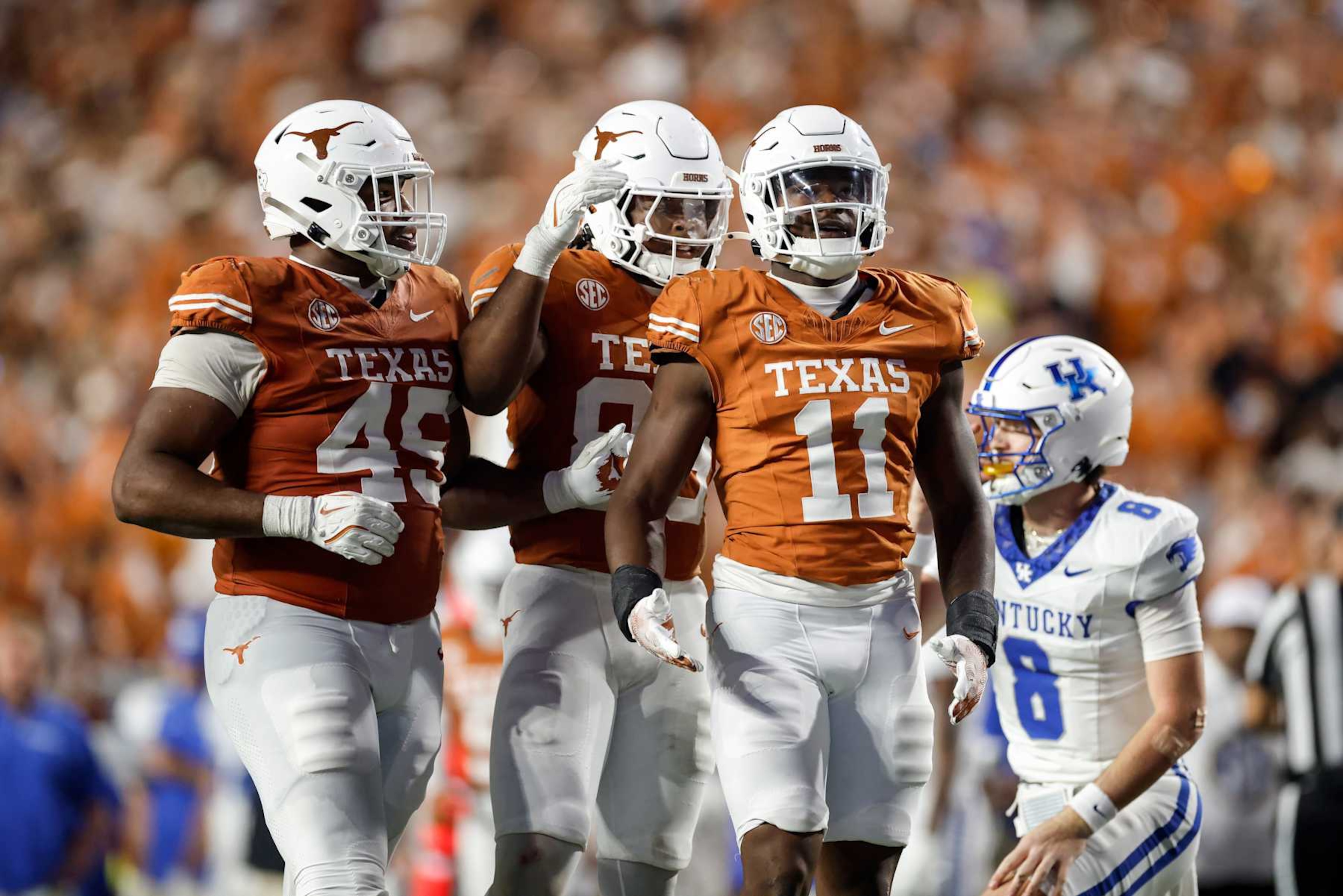 AUSTIN, TEXAS - NOVEMBER 23: Colin Simmons #11 of the Texas Longhorns celebrates after a sack in the second half against the Kentucky Wildcats at Darrell K Royal-Texas Memorial Stadium on November 23, 2024 in Austin, Texas. (Photo by Tim Warner/Getty Images)