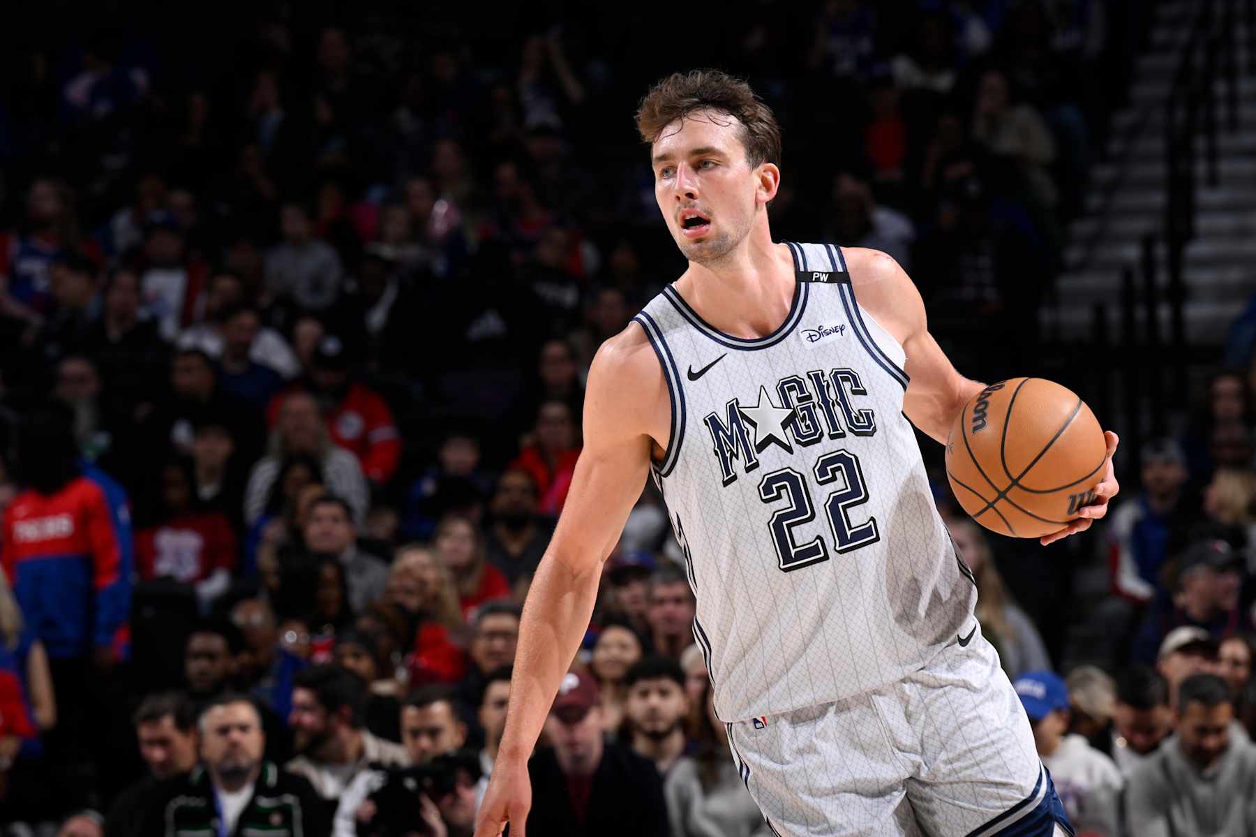 PHILADELPHIA, PA - DECEMBER 6: Franz Wagner #22 of the Orlando Magic dribbles the ball during the game against the Philadelphia 76ers on December 6, 2024 at the Wells Fargo Center in Philadelphia, Pennsylvania NOTE TO USER: User expressly acknowledges and agrees that, by downloading and/or using this Photograph, user is consenting to the terms and conditions of the Getty Images License Agreement. Mandatory Copyright Notice: Copyright 2024 NBAE (Photo by David Dow/NBAE via Getty Images)