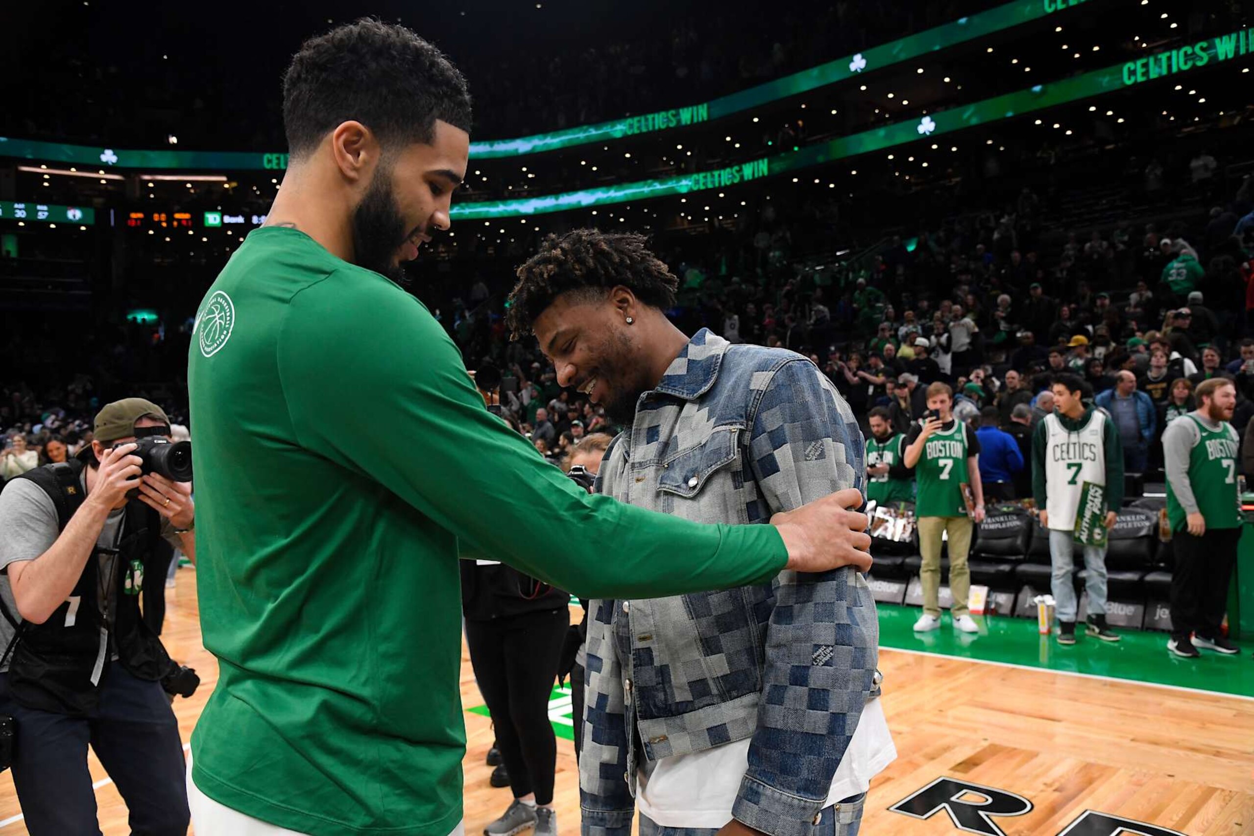 BOSTON, MA - FEBRUARY 4: Jayson Tatum #0 of the Boston Celtics embraces Marcus Smart after the game against the Memphis Grizzlies on February 4, 2024 at the TD Garden in Boston, Massachusetts. NOTE TO USER: User expressly acknowledges and agrees that, by downloading and or using this photograph, User is consenting to the terms and conditions of the Getty Images License Agreement. Mandatory Copyright Notice: Copyright 2024 NBAE  (Photo by Brian Babineau/NBAE via Getty Images)