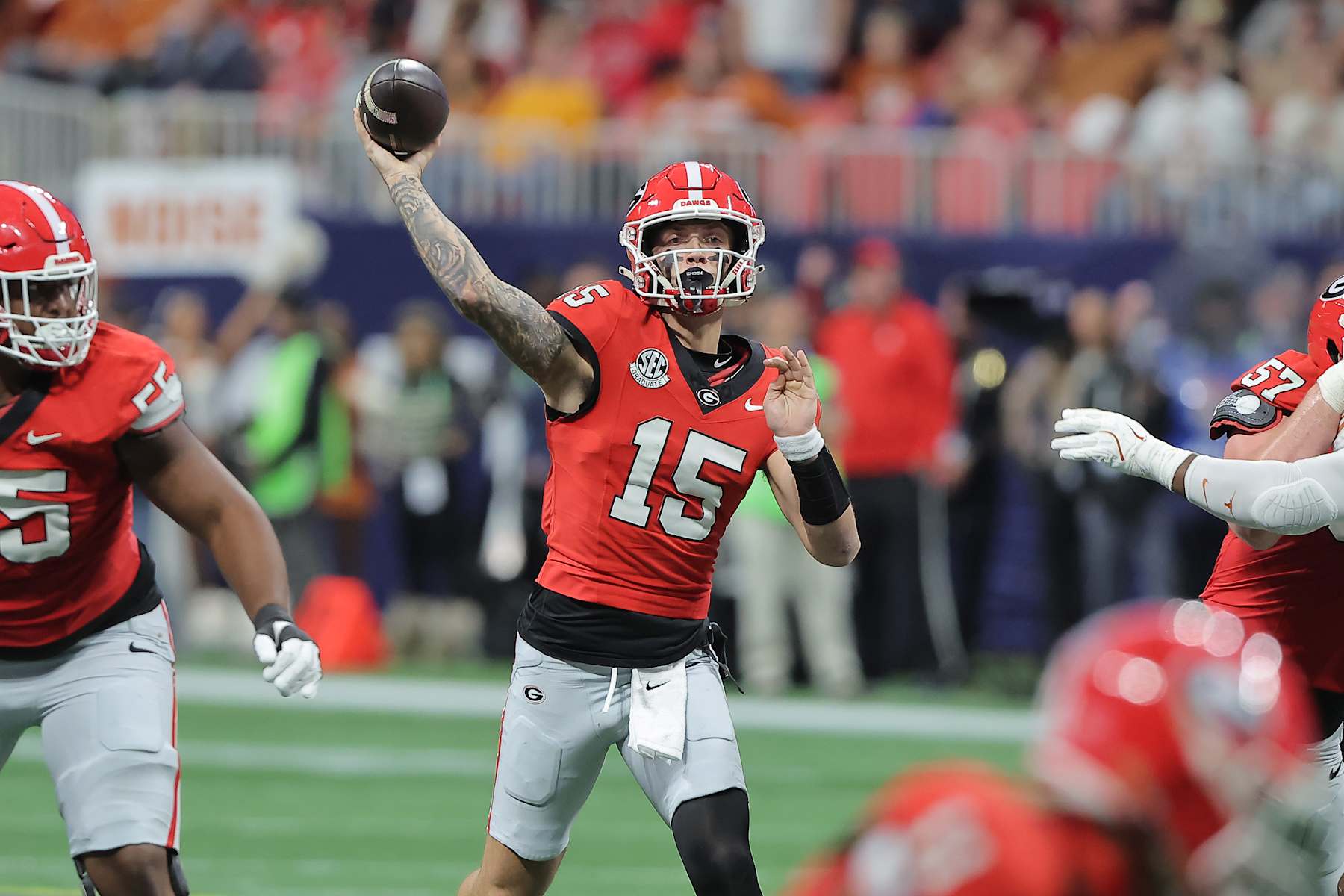 ATLANTA, GA - DECEMBER 07: Georgia Bulldogs quarterback Carson Beck (15) passes during the SEC championship football game between the Georgia Bulldogs and the Texas Longhorns on December 7, 2024 at the Mercedes-Benz Stadium in Atlanta, Georgia.  (Photo by David J. Griffin/Icon Sportswire via Getty Images)