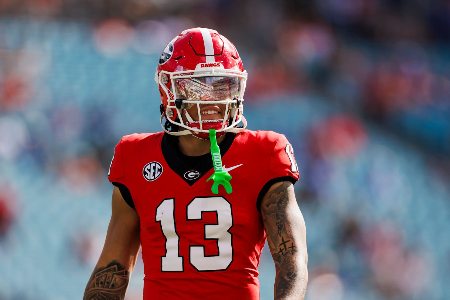 JACKSONVILLE, FLORIDA - NOVEMBER 02: Michael Jackson III #13 of the Georgia Bulldogs looks on before the start of a game against the Florida Gators at EverBank Stadium on November 02, 2024 in Jacksonville, Florida. (Photo by James Gilbert/Getty Images)