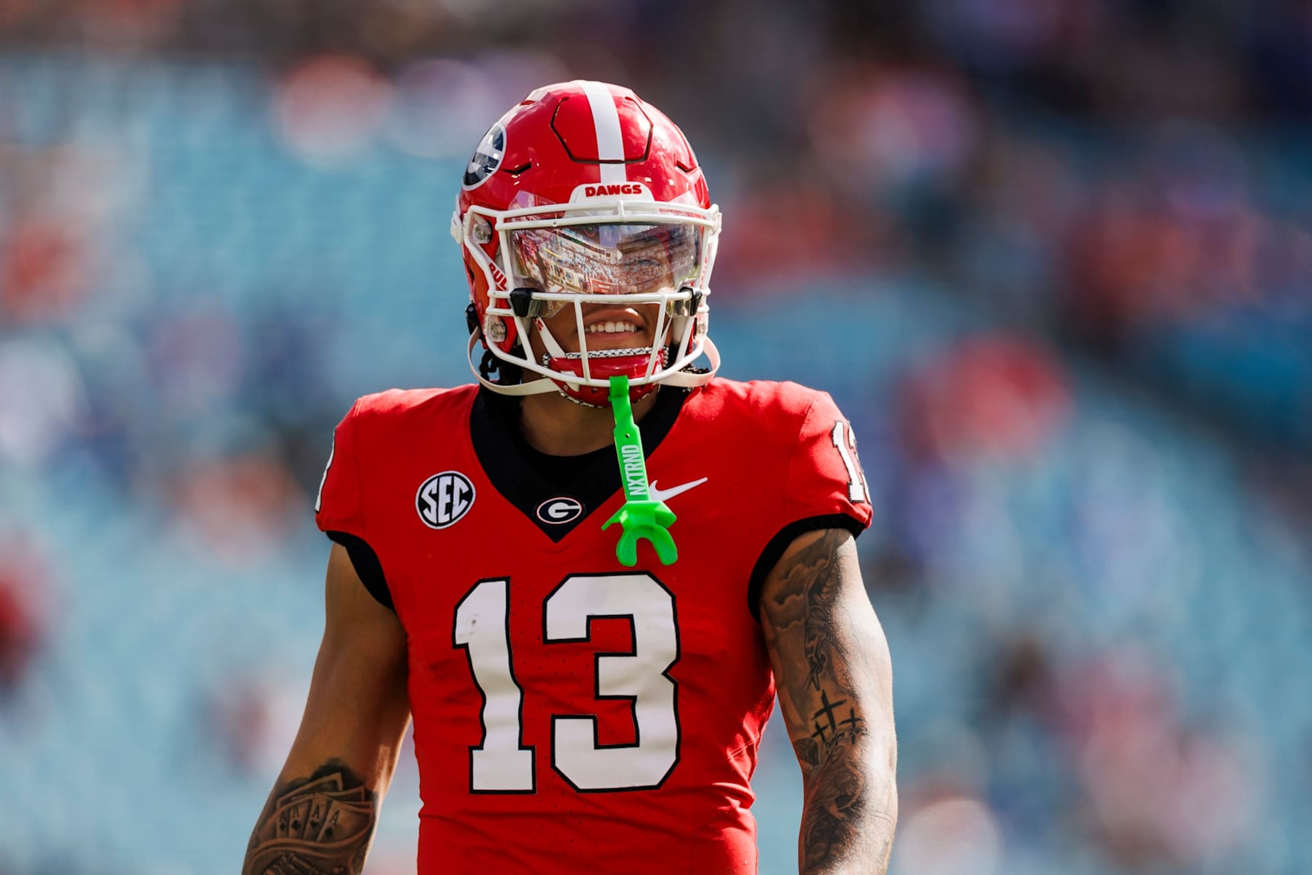 JACKSONVILLE, FLORIDA - NOVEMBER 02: Michael Jackson III #13 of the Georgia Bulldogs looks on before the start of a game against the Florida Gators at EverBank Stadium on November 02, 2024 in Jacksonville, Florida. (Photo by James Gilbert/Getty Images)
