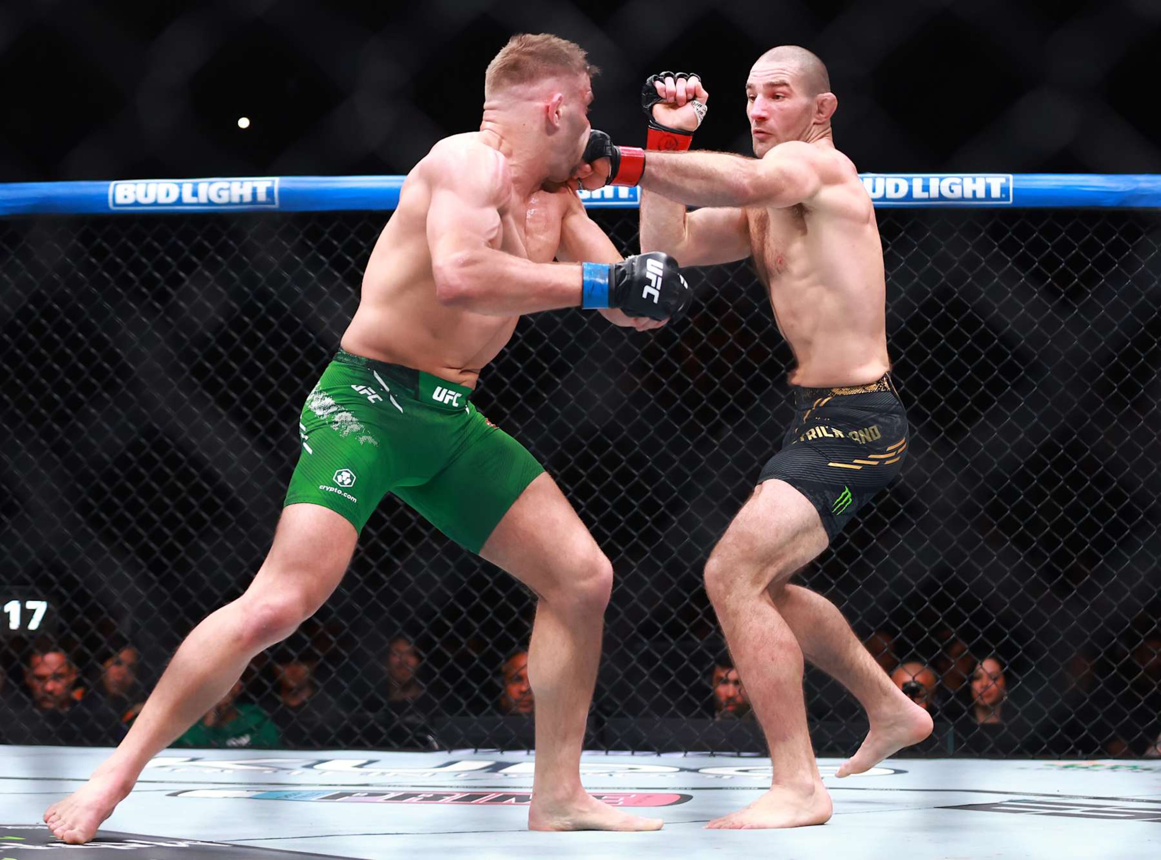 TORONTO, ON - JANUARY 20: Sean Strickland of the United States fights against Dricus Du Plessis of South Africa in a middleweight title bout during the UFC 297 event at Scotiabank Arena on January 20, 2024 in Toronto, Ontario, Canada. (Photo by Vaughn Ridley/Getty Images) TORONTO, ON - JANUARY 20: Sean Strickland of the United States fights against Dricus Du Plessis of South Africa in a middleweight title bout during the UFC 297 event at Scotiabank Arena on January 20, 2024 in Toronto, Ontario, Canada. (Photo by Vaughn Ridley/Getty Images)