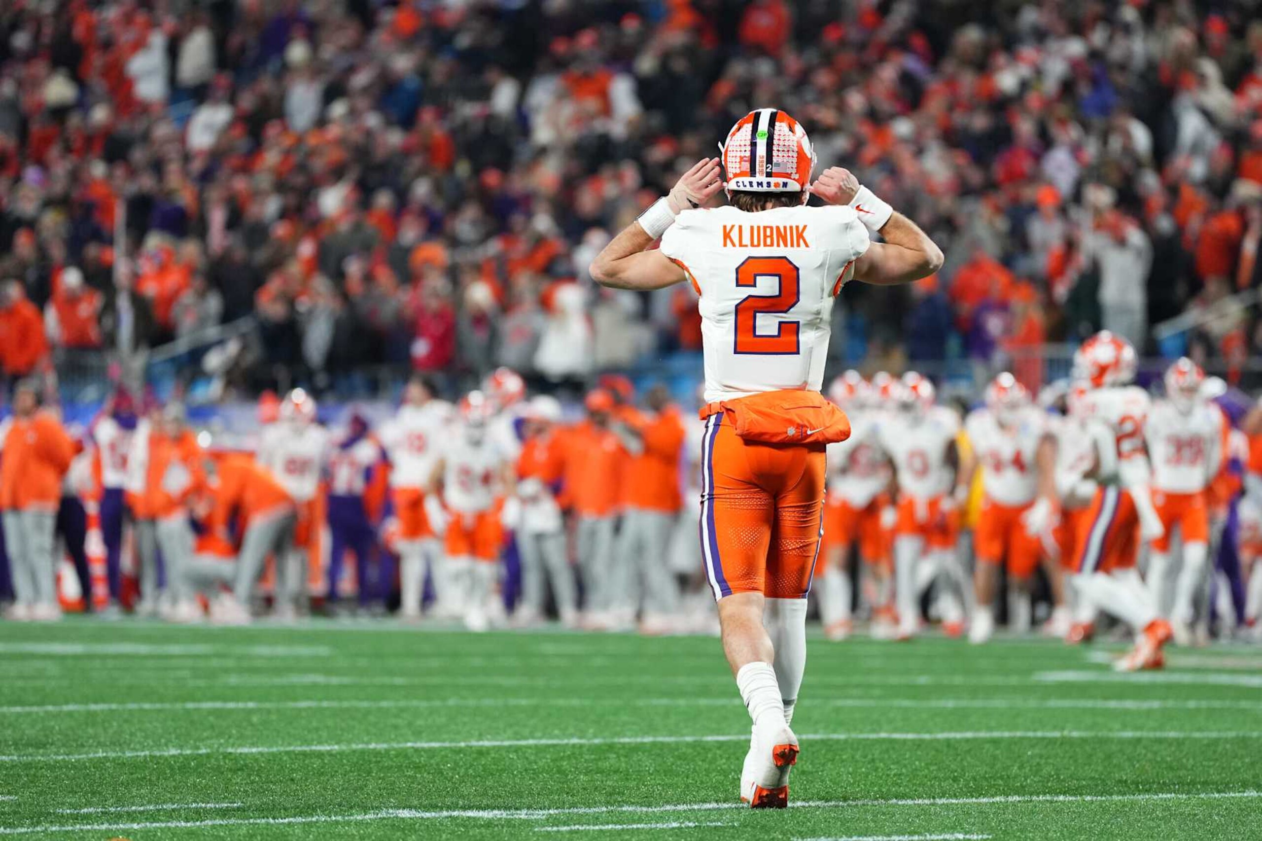 CHARLOTTE, NORTH CAROLINA - DECEMBER 07: Cade Klubnik #2 of the Clemson Tigers reacts during the second quarter of the 2024 ACC Football Championship at Bank of America Stadium on December 07, 2024 in Charlotte, North Carolina. (Photo by Grant Halverson/Getty Images) CHARLOTTE, NORTH CAROLINA - DECEMBER 07: Cade Klubnik #2 of the Clemson Tigers reacts during the second quarter of the 2024 ACC Football Championship at Bank of America Stadium on December 07, 2024 in Charlotte, North Carolina. (Photo by Grant Halverson/Getty Images)