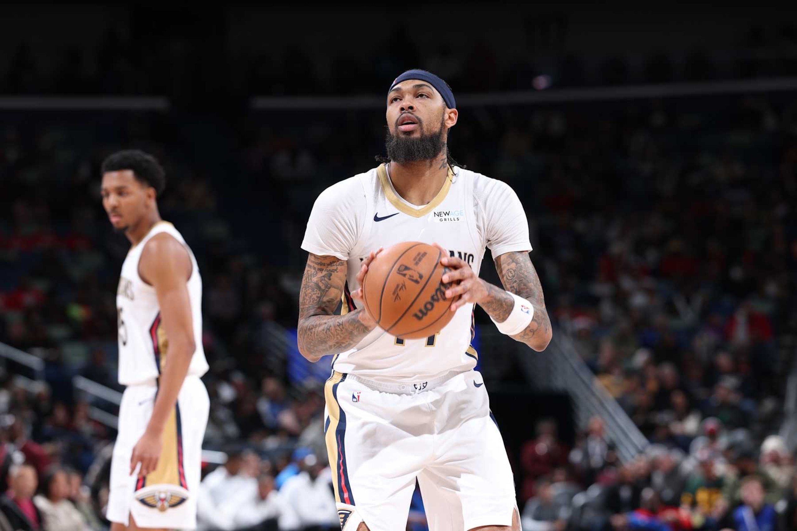 NEW ORLEANS, LA - DECEMBER 7:  Brandon Ingram #14 of the New Orleans Pelicans prepares to shoot a free throw during the game against the Oklahoma City Thunder  during a regular season game on December 7, 2024 at United Center in Chicago, Illinois. NOTE TO USER: User expressly acknowledges and agrees that, by downloading and or using this photograph, User is consenting to the terms and conditions of the Getty Images License Agreement. Mandatory Copyright Notice: Copyright 2024 NBAE (Photo by Jeff Haynes/NBAE via Getty Images)