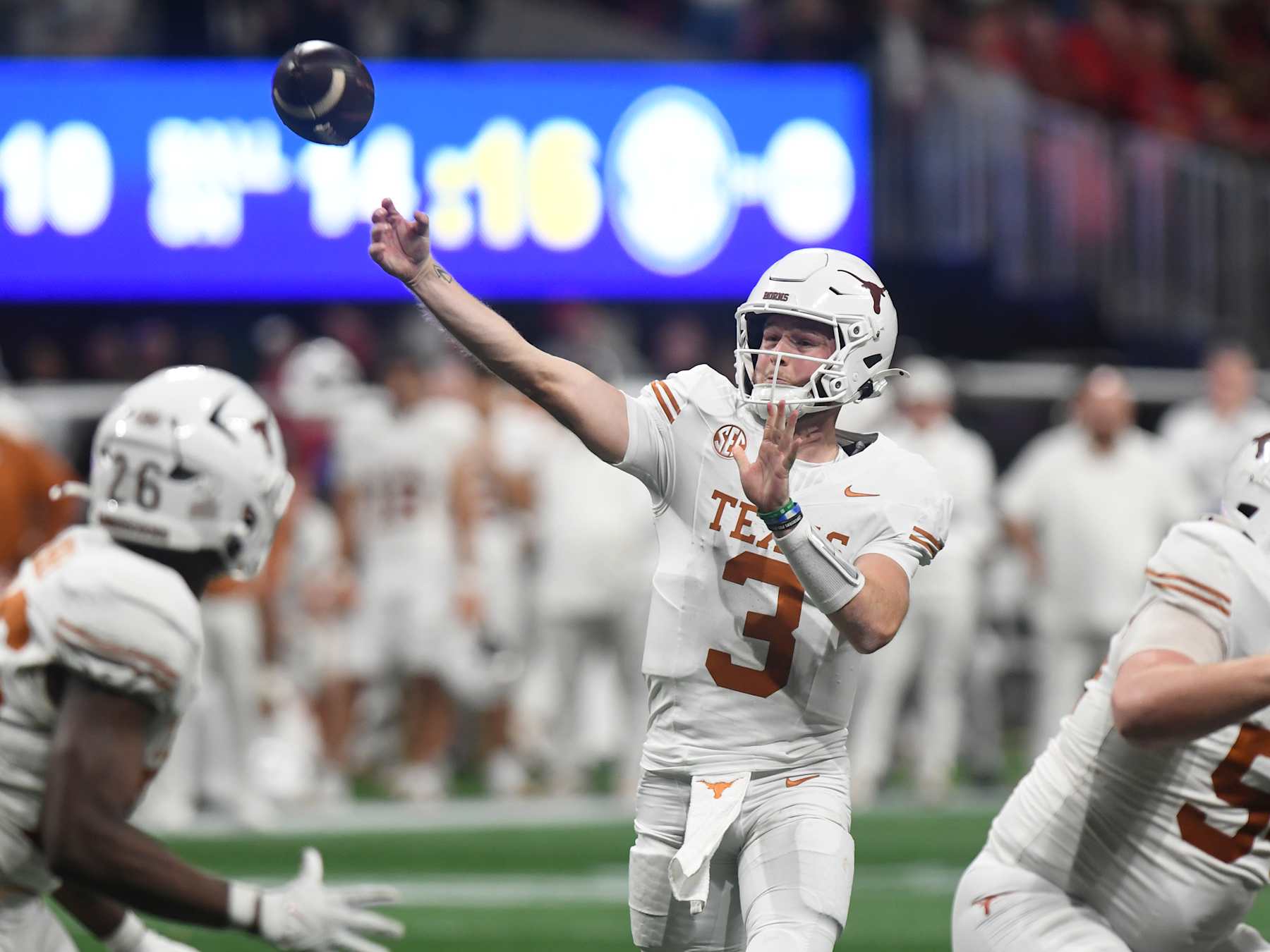 ATLANTA, GA - DECEMBER 07: Texas Longhorns quarterback Quinn Ewers (3) passes the ball during the SEC Championship game between the Georgia Bulldogs and the Texas Longhorns on December 07, 2024, at Mercedes-Benz Stadium in Atlanta, GA. (Photo by Jeffrey Vest/Icon Sportswire via Getty Images)