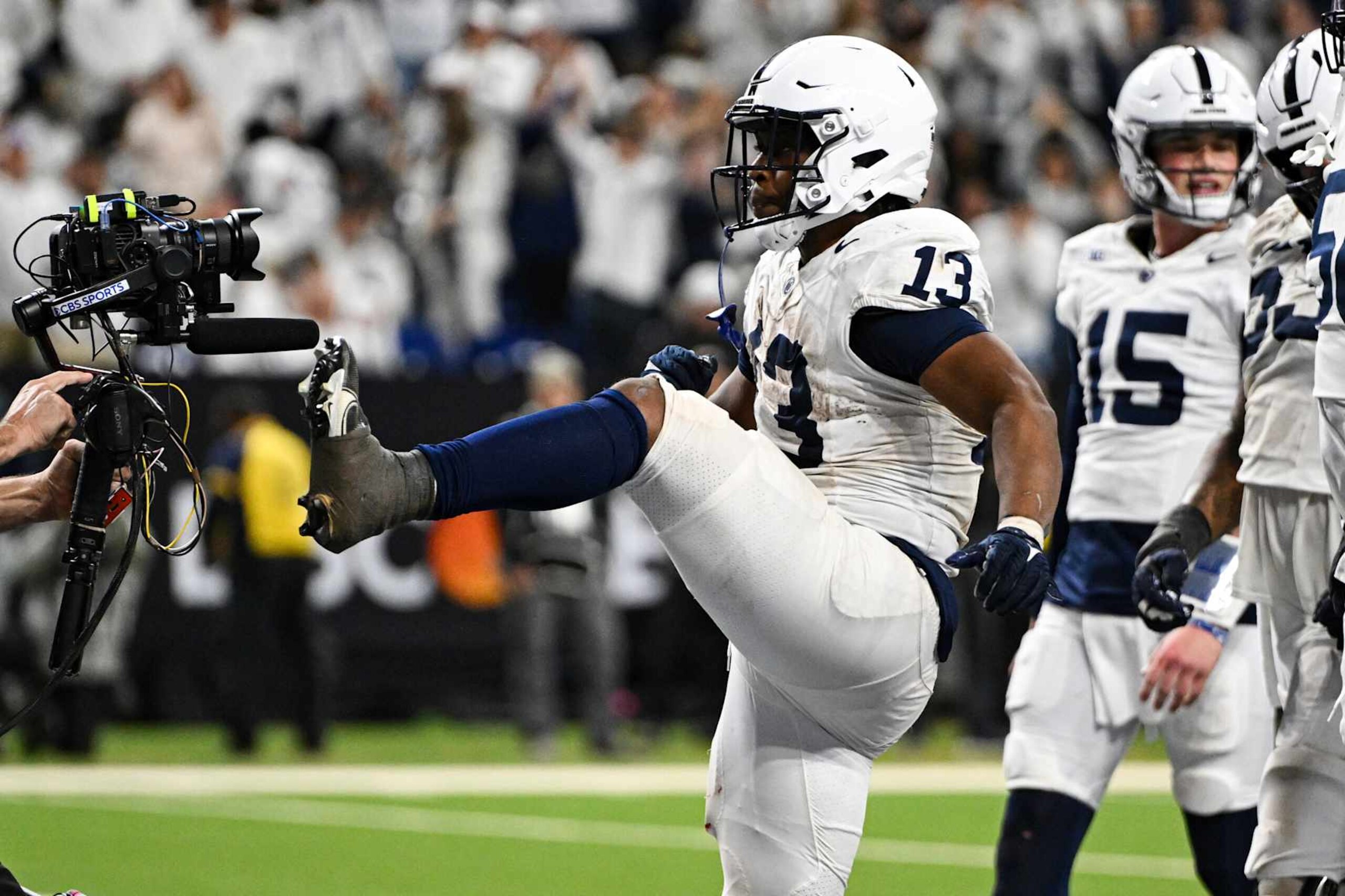 INDIANAPOLIS, IN - DECEMBER 07: Penn State Nittany Lions RB Kaytron Allen (13) celebrates a touchdown during the Big Ten Championship football game between the Penn State Nittany Lions and the Oregon Ducks on December 7, 2024 at Lucas Oil Stadium in Indianapolis, IN (Photo by James Black/Icon Sportswire via Getty Images)