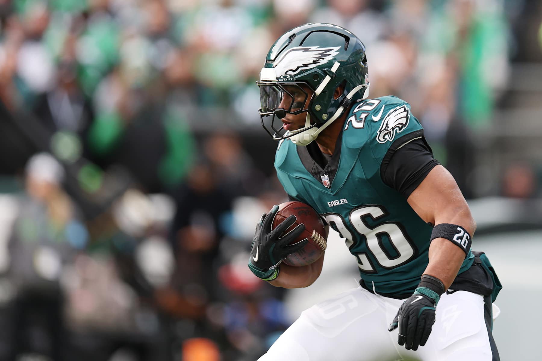PHILADELPHIA, PENNSYLVANIA - DECEMBER 08: Saquon Barkley #26 of the Philadelphia Eagles runs the ball up the field during the first half of a game against the Carolina Panthers at Lincoln Financial Field on December 08, 2024 in Philadelphia, Pennsylvania. (Photo by Emilee Chinn/Getty Images)