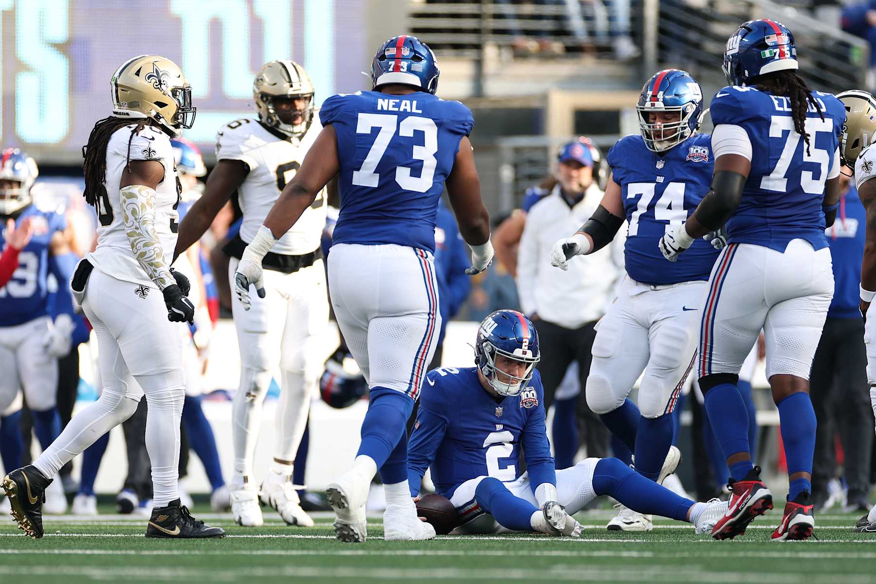 EAST RUTHERFORD, NEW JERSEY - DECEMBER 08: Drew Lock #2 of the New York Giants reacts after being tackled during the second quarter against the New Orleans Saints at MetLife Stadium on December 08, 2024 in East Rutherford, New Jersey. (Photo by Sarah Stier/Getty Images)