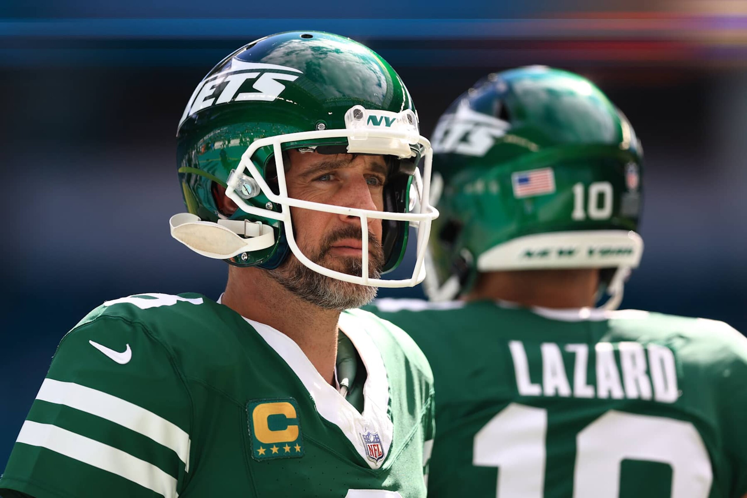 MIAMI GARDENS, FLORIDA - DECEMBER 08: Aaron Rodgers #8 of the New York Jets warms up before a game against the Miami Dolphins at Hard Rock Stadium on December 08, 2024 in Miami Gardens, Florida. (Photo by Megan Briggs/Getty Images)