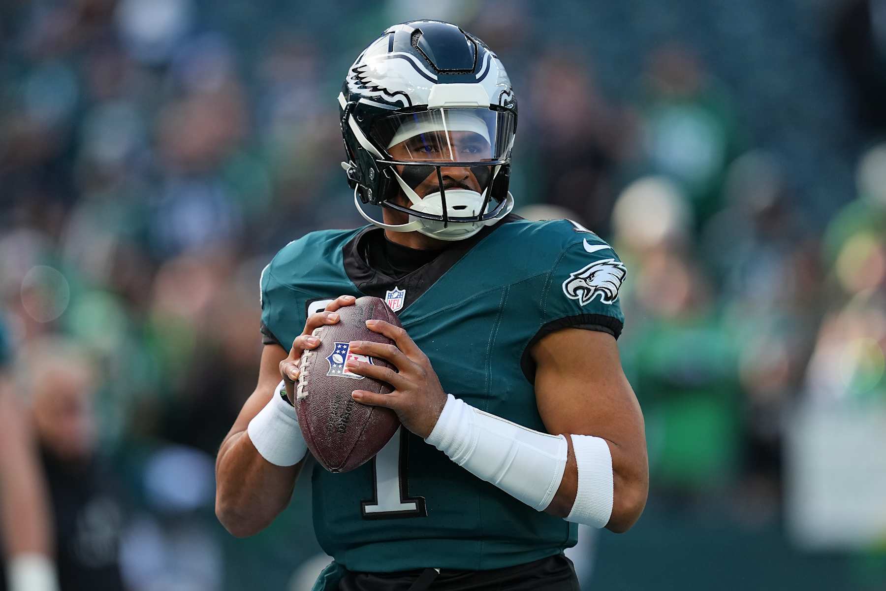 PHILADELPHIA, PENNSYLVANIA - DECEMBER 08: Jalen Hurts #1 of the Philadelphia Eagles warms up before a game against the Carolina Panthers at Lincoln Financial Field on December 08, 2024 in Philadelphia, Pennsylvania. (Photo by Mitchell Leff/Getty Images)