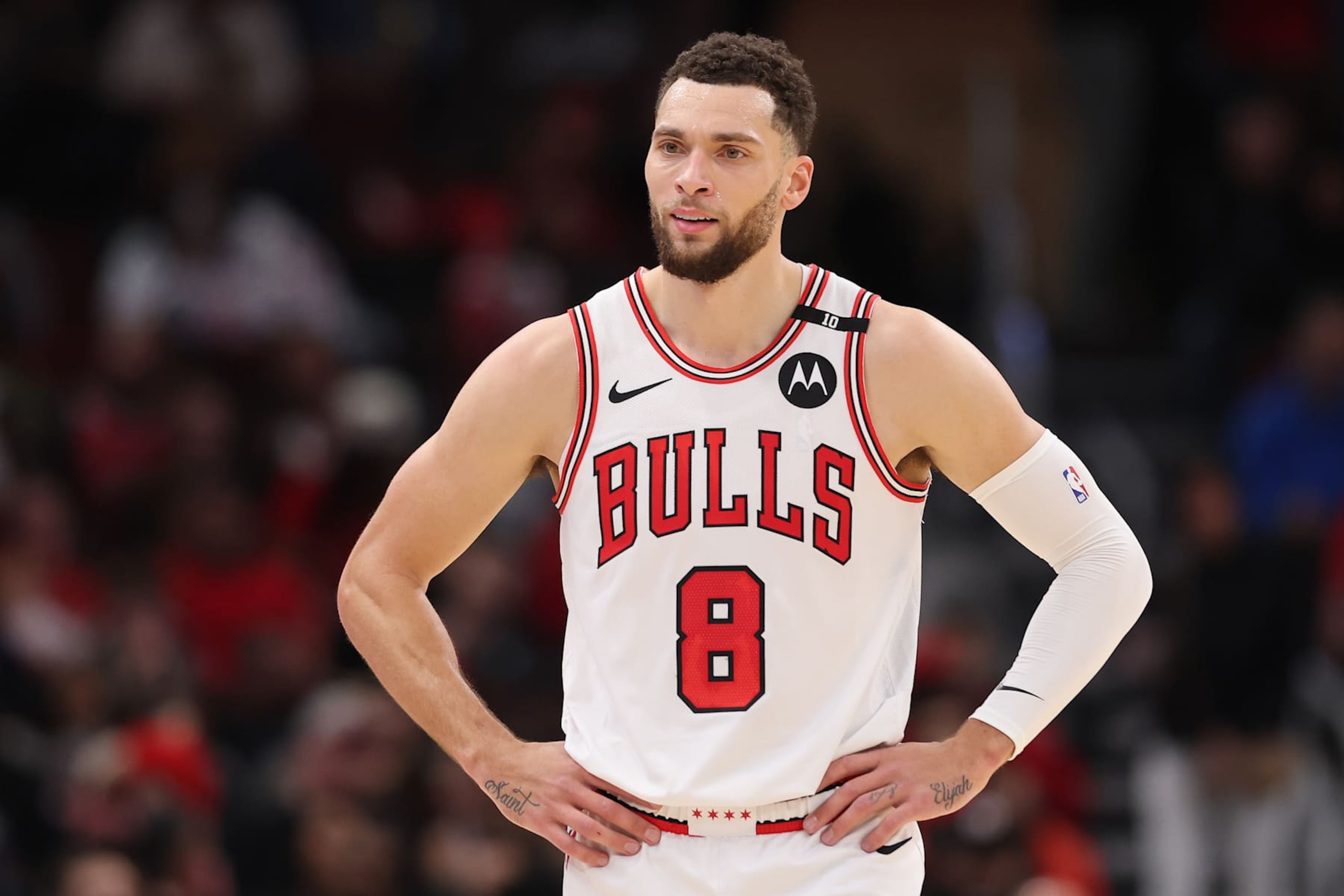 CHICAGO, ILLINOIS - DECEMBER 08: Zach LaVine #8 of the Chicago Bulls looks on against the Philadelphia 76ers during the first half at the United Center on December 08, 2024 in Chicago, Illinois. NOTE TO USER: User expressly acknowledges and agrees that, by downloading and or using this photograph, User is consenting to the terms and conditions of the Getty Images License Agreement. (Photo by Michael Reaves/Getty Images) CHICAGO, ILLINOIS - DECEMBER 08: Zach LaVine #8 of the Chicago Bulls looks on against the Philadelphia 76ers during the first half at the United Center on December 08, 2024 in Chicago, Illinois. NOTE TO USER: User expressly acknowledges and agrees that, by downloading and or using this photograph, User is consenting to the terms and conditions of the Getty Images License Agreement. (Photo by Michael Reaves/Getty Images)