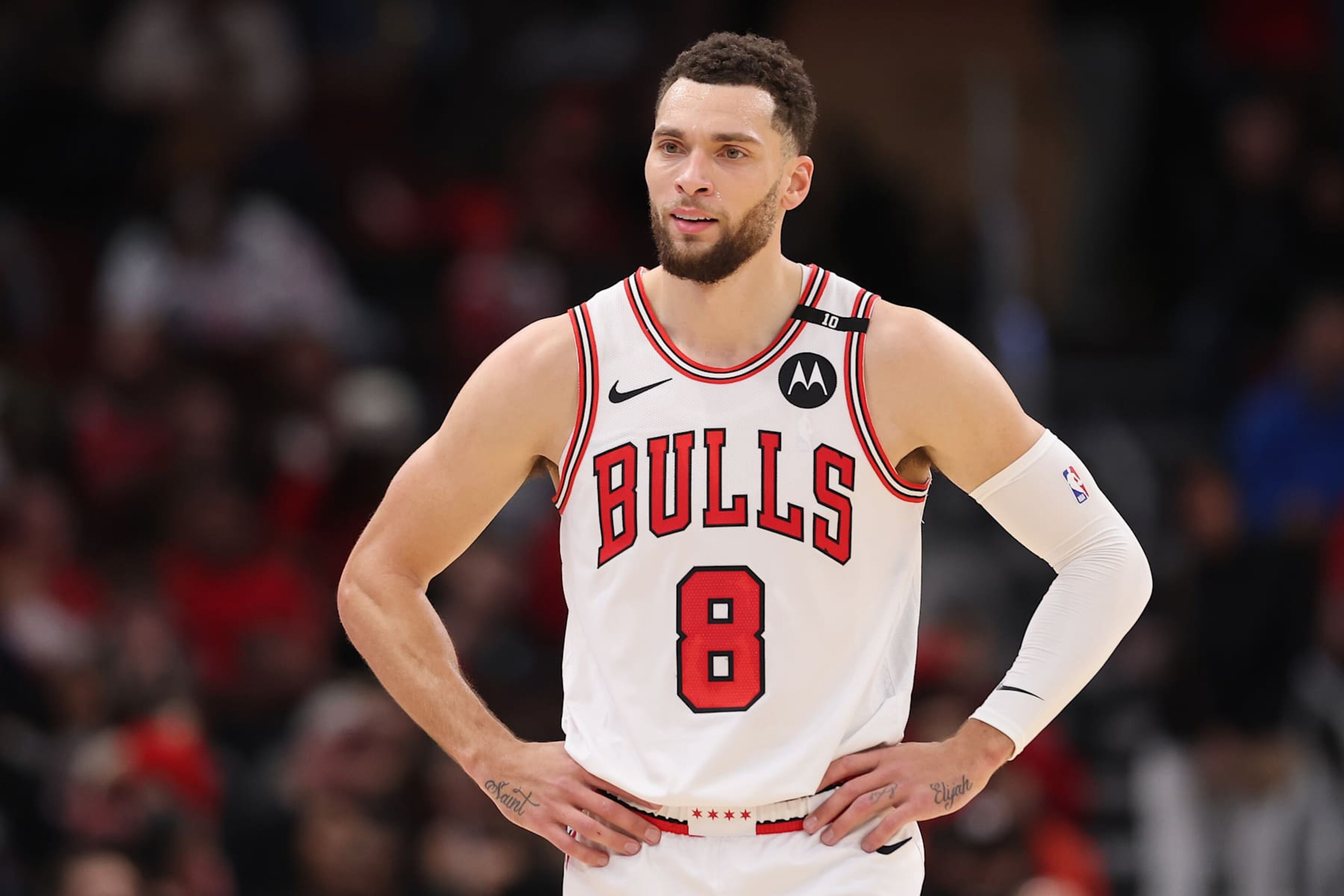 CHICAGO, ILLINOIS - DECEMBER 08: Zach LaVine #8 of the Chicago Bulls looks on against the Philadelphia 76ers during the first half at the United Center on December 08, 2024 in Chicago, Illinois. NOTE TO USER: User expressly acknowledges and agrees that, by downloading and or using this photograph, User is consenting to the terms and conditions of the Getty Images License Agreement.  (Photo by Michael Reaves/Getty Images)
