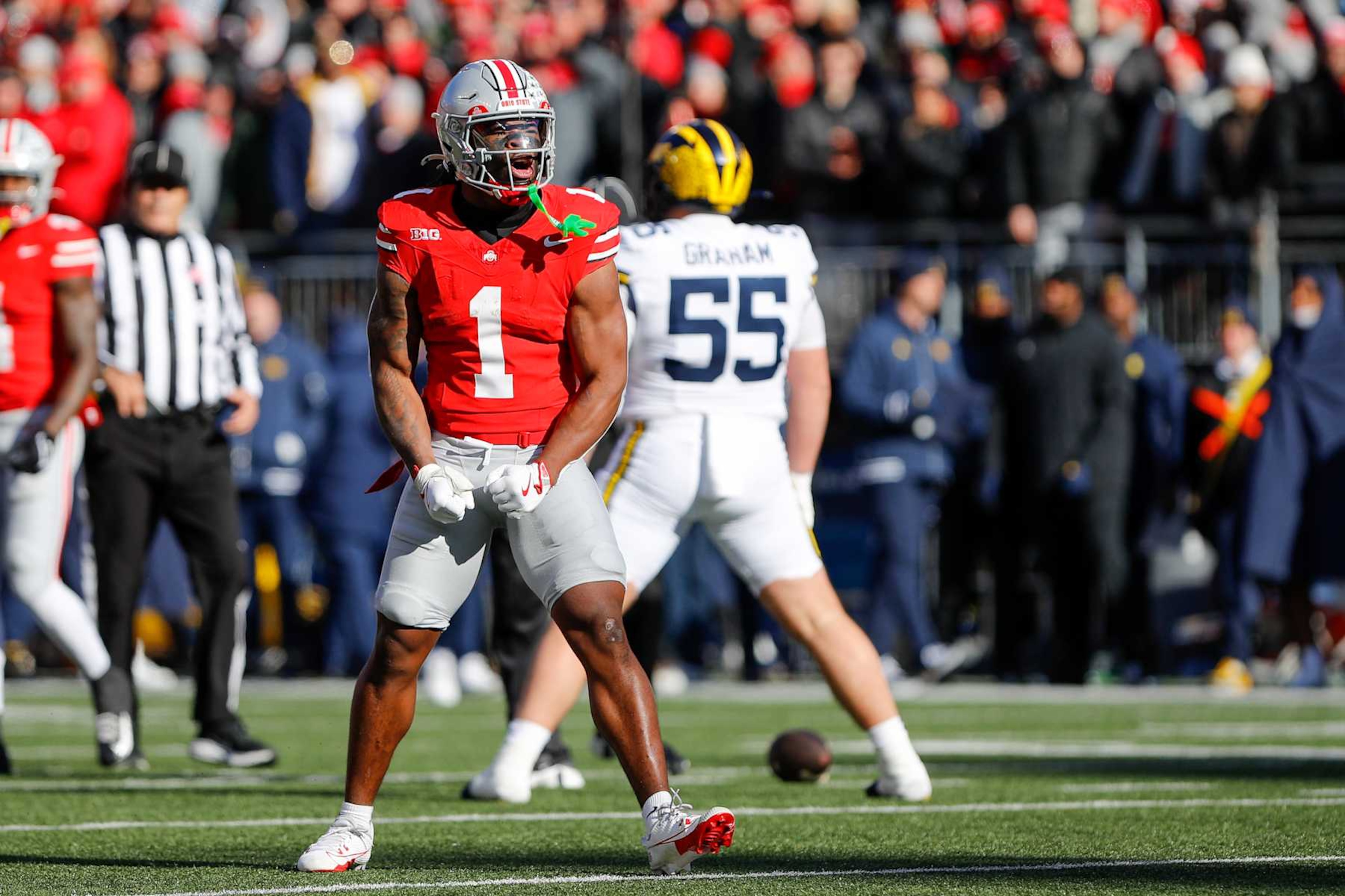 COLUMBUS, OH - NOVEMBER 30: Ohio State Buckeyes running back Quinshon Judkins (1) reacts during the game against the Michigan Wolverines and the Ohio State Buckeyes on November 30, 2024, at Ohio Stadium in Columbus, OH. (Photo by Ian Johnson/Icon Sportswire via Getty Images) COLUMBUS, OH - NOVEMBER 30: Ohio State Buckeyes running back Quinshon Judkins (1) reacts during the game against the Michigan Wolverines and the Ohio State Buckeyes on November 30, 2024, at Ohio Stadium in Columbus, OH. (Photo by Ian Johnson/Icon Sportswire via Getty Images)
