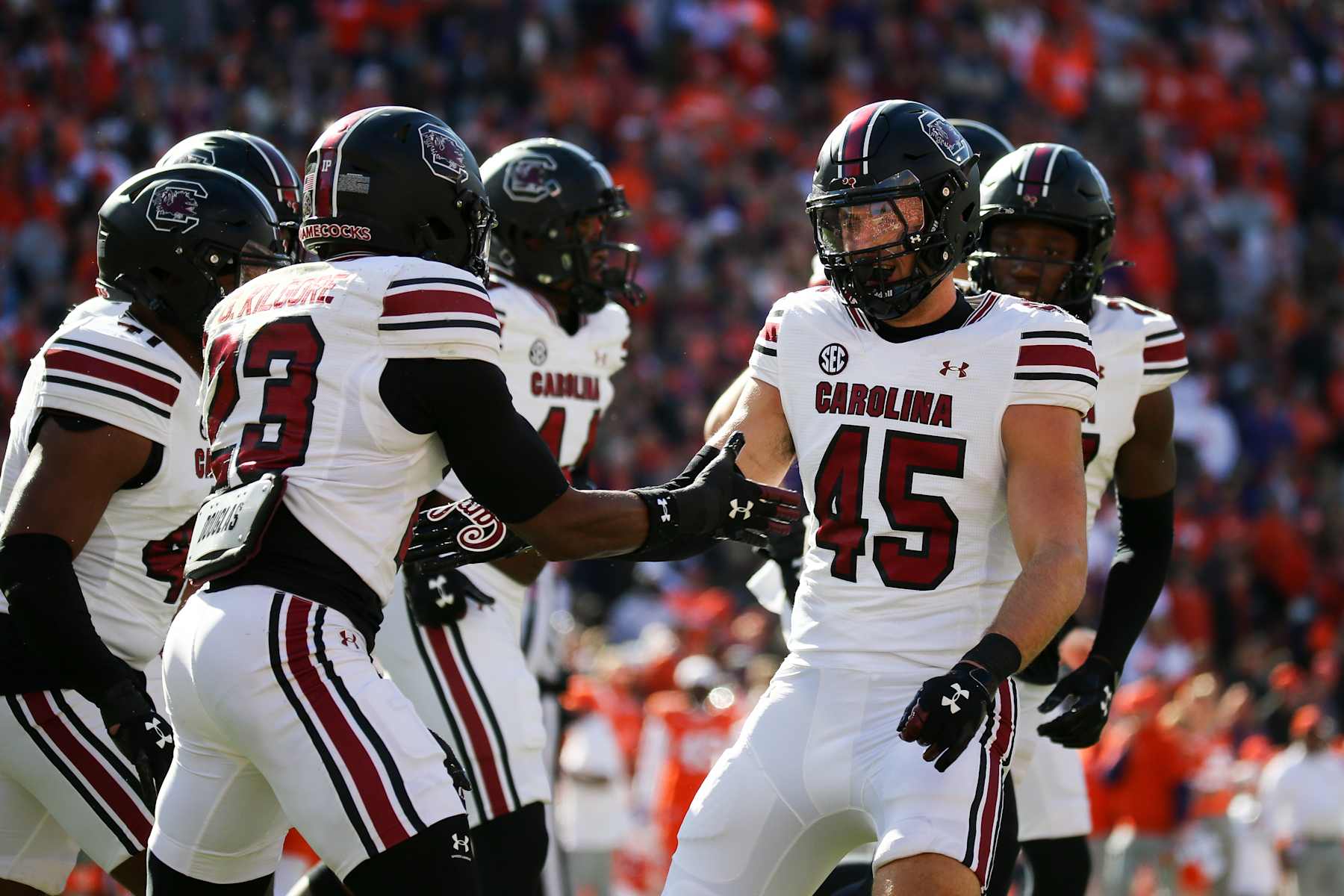 CLEMSON, SOUTH CAROLINA - NOVEMBER 30: Colin Bryant #45 of the South Carolina Gamecocks reacts with Gerald Kilgore #23 of the South Carolina Gamecocks after a play against the Clemson Tigers at Memorial Stadium on November 30, 2024 in Clemson, South Carolina.  (Photo by Isaiah Vazquez/Getty Images)