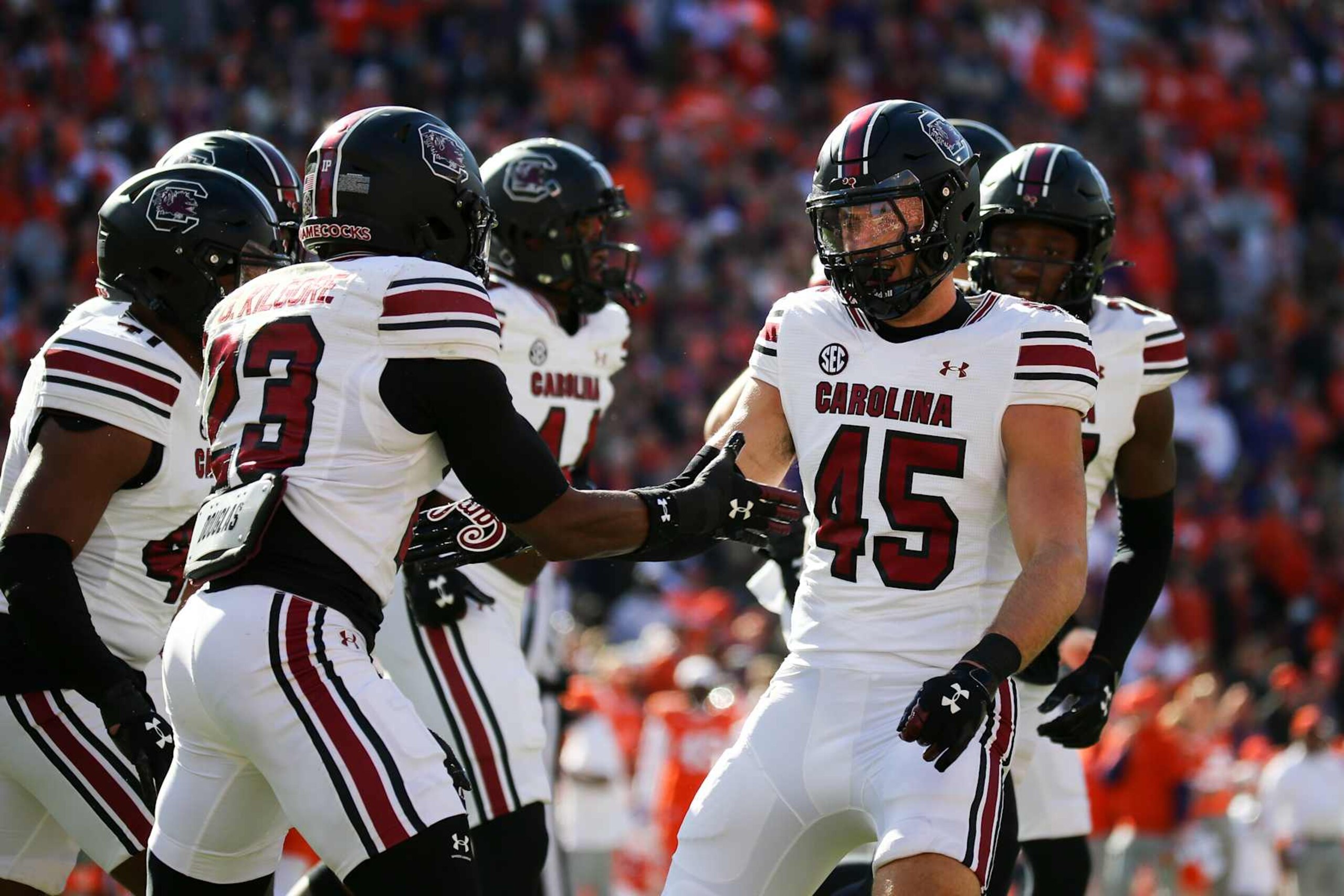 CLEMSON, SOUTH CAROLINA - NOVEMBER 30: Colin Bryant #45 of the South Carolina Gamecocks reacts with Gerald Kilgore #23 of the South Carolina Gamecocks after a play against the Clemson Tigers at Memorial Stadium on November 30, 2024 in Clemson, South Carolina.  (Photo by Isaiah Vazquez/Getty Images)