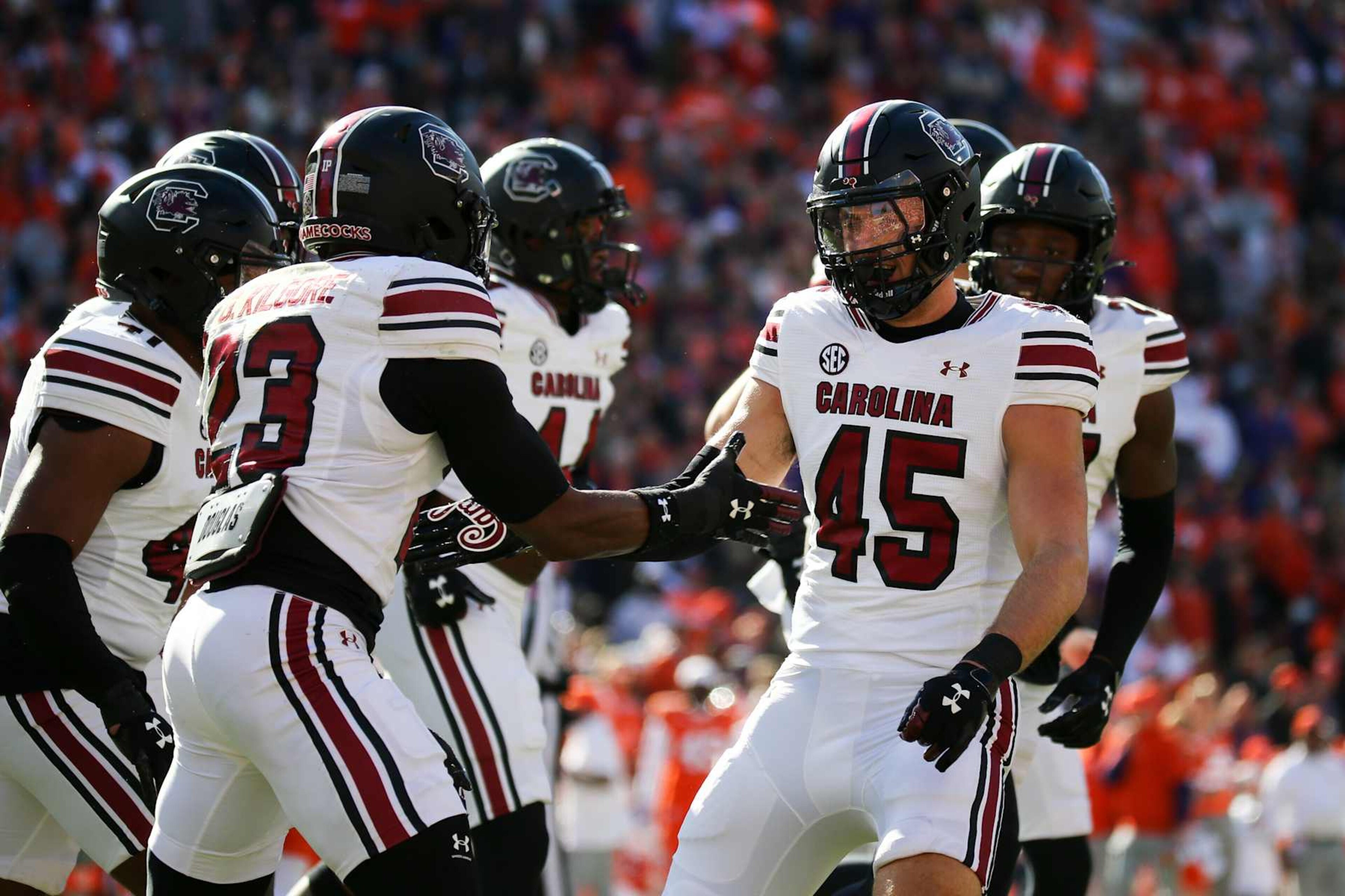 CLEMSON, SOUTH CAROLINA - NOVEMBER 30: Colin Bryant #45 of the South Carolina Gamecocks reacts with Gerald Kilgore #23 of the South Carolina Gamecocks after a play against the Clemson Tigers at Memorial Stadium on November 30, 2024 in Clemson, South Carolina. (Photo by Isaiah Vazquez/Getty Images) CLEMSON, SOUTH CAROLINA - NOVEMBER 30: Colin Bryant #45 of the South Carolina Gamecocks reacts with Gerald Kilgore #23 of the South Carolina Gamecocks after a play against the Clemson Tigers at Memorial Stadium on November 30, 2024 in Clemson, South Carolina. (Photo by Isaiah Vazquez/Getty Images)