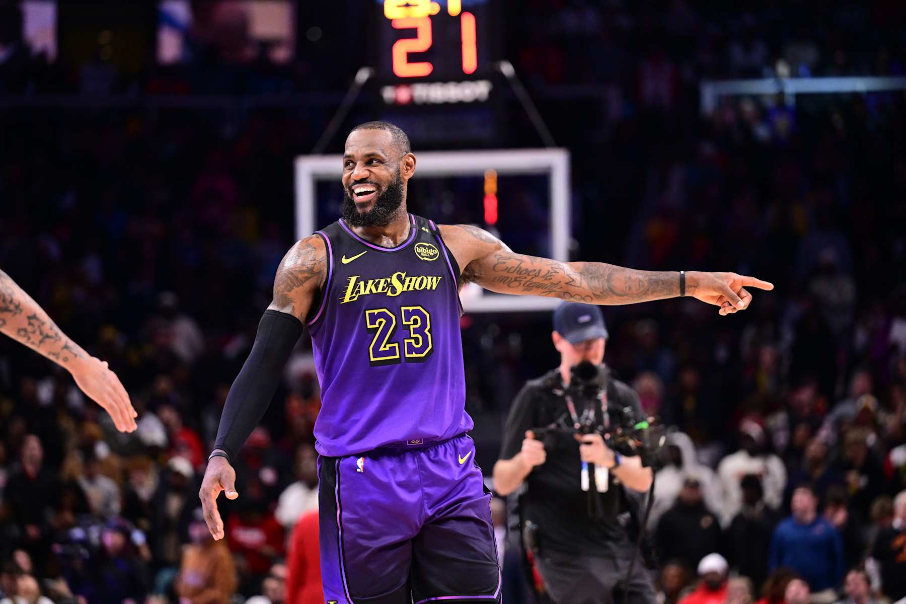 ATLANTA, GA - DECEMBER 6: LeBron James #23 of the Los Angeles Lakers smiles during the game against the Atlanta Hawks on December 6, 2024 at State Farm Arena in Atlanta, Georgia.  NOTE TO USER: User expressly acknowledges and agrees that, by downloading and/or using this Photograph, user is consenting to the terms and conditions of the Getty Images License Agreement. Mandatory Copyright Notice: Copyright 2024 NBAE (Photo by Adam Hagy/NBAE via Getty Images)