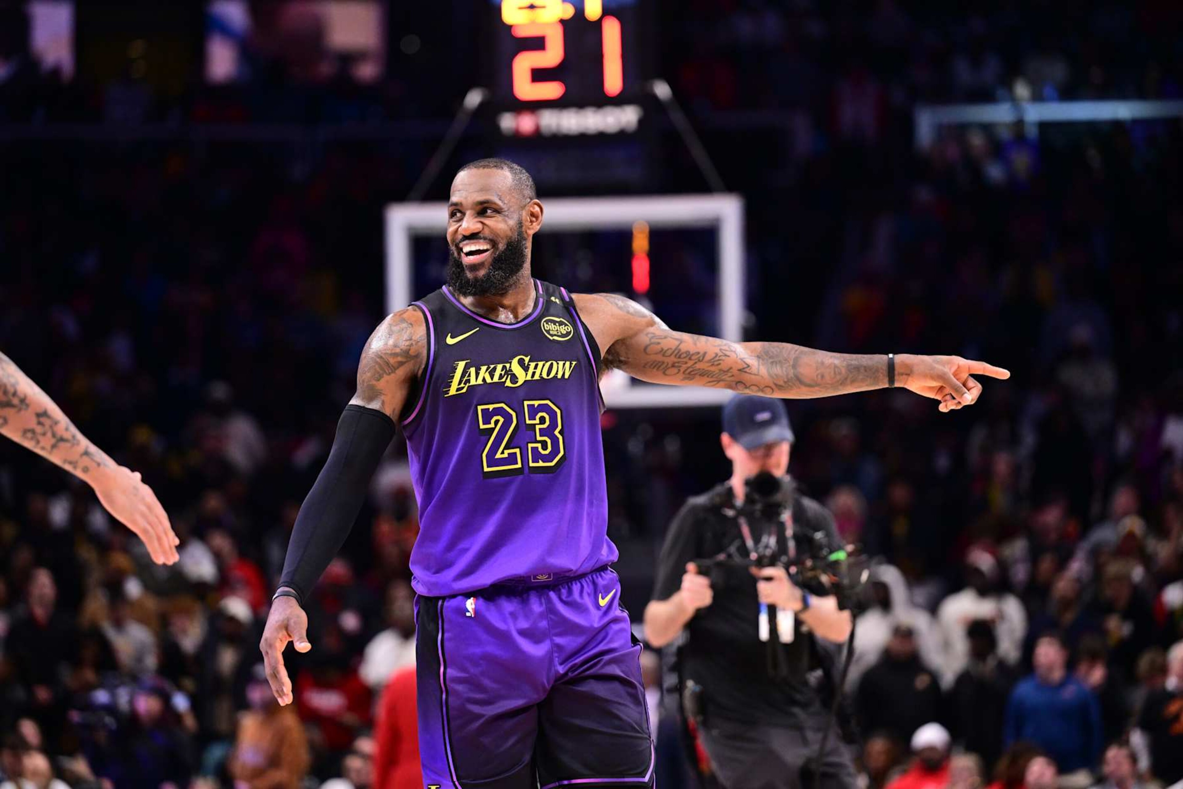 ATLANTA, GA - DECEMBER 6: LeBron James #23 of the Los Angeles Lakers smiles during the game against the Atlanta Hawks on December 6, 2024 at State Farm Arena in Atlanta, Georgia. NOTE TO USER: User expressly acknowledges and agrees that, by downloading and/or using this Photograph, user is consenting to the terms and conditions of the Getty Images License Agreement. Mandatory Copyright Notice: Copyright 2024 NBAE (Photo by Adam Hagy/NBAE via Getty Images) ATLANTA, GA - DECEMBER 6: LeBron James #23 of the Los Angeles Lakers smiles during the game against the Atlanta Hawks on December 6, 2024 at State Farm Arena in Atlanta, Georgia. NOTE TO USER: User expressly acknowledges and agrees that, by downloading and/or using this Photograph, user is consenting to the terms and conditions of the Getty Images License Agreement. Mandatory Copyright Notice: Copyright 2024 NBAE (Photo by Adam Hagy/NBAE via Getty Images)