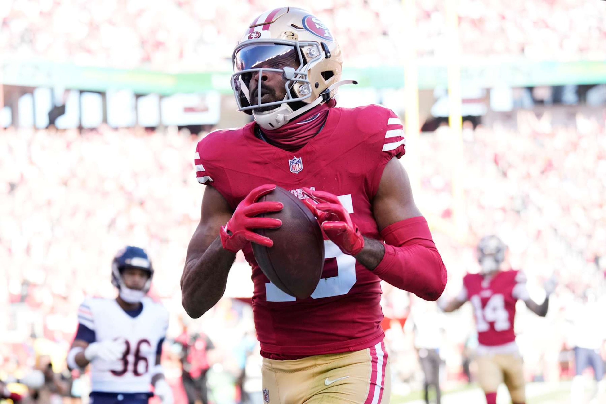 SANTA CLARA, CALIFORNIA - DECEMBER 08: Jauan Jennings #15 of the San Francisco 49ers scores a touchdown during the first quarter against the Chicago Bears at Levi's Stadium on December 08, 2024 in Santa Clara, California. (Photo by Thearon W. Henderson/Getty Images)