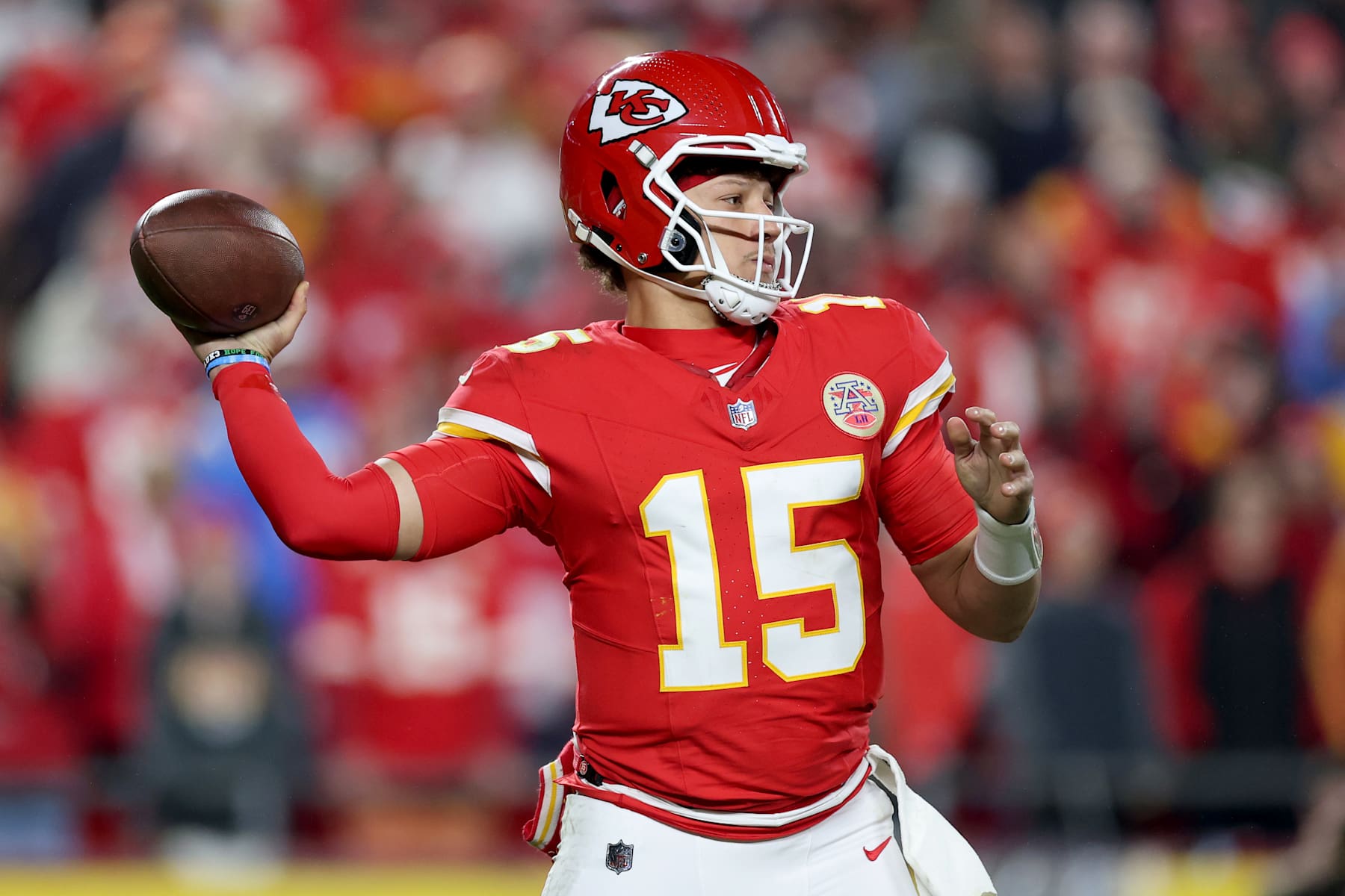 KANSAS CITY, MISSOURI - DECEMBER 08: Patrick Mahomes #15 of the Kansas City Chiefs throws a pass against the Los Angeles Chargers during the second quarter at GEHA Field at Arrowhead Stadium on December 08, 2024 in Kansas City, Missouri. (Photo by Jamie Squire/Getty Images)